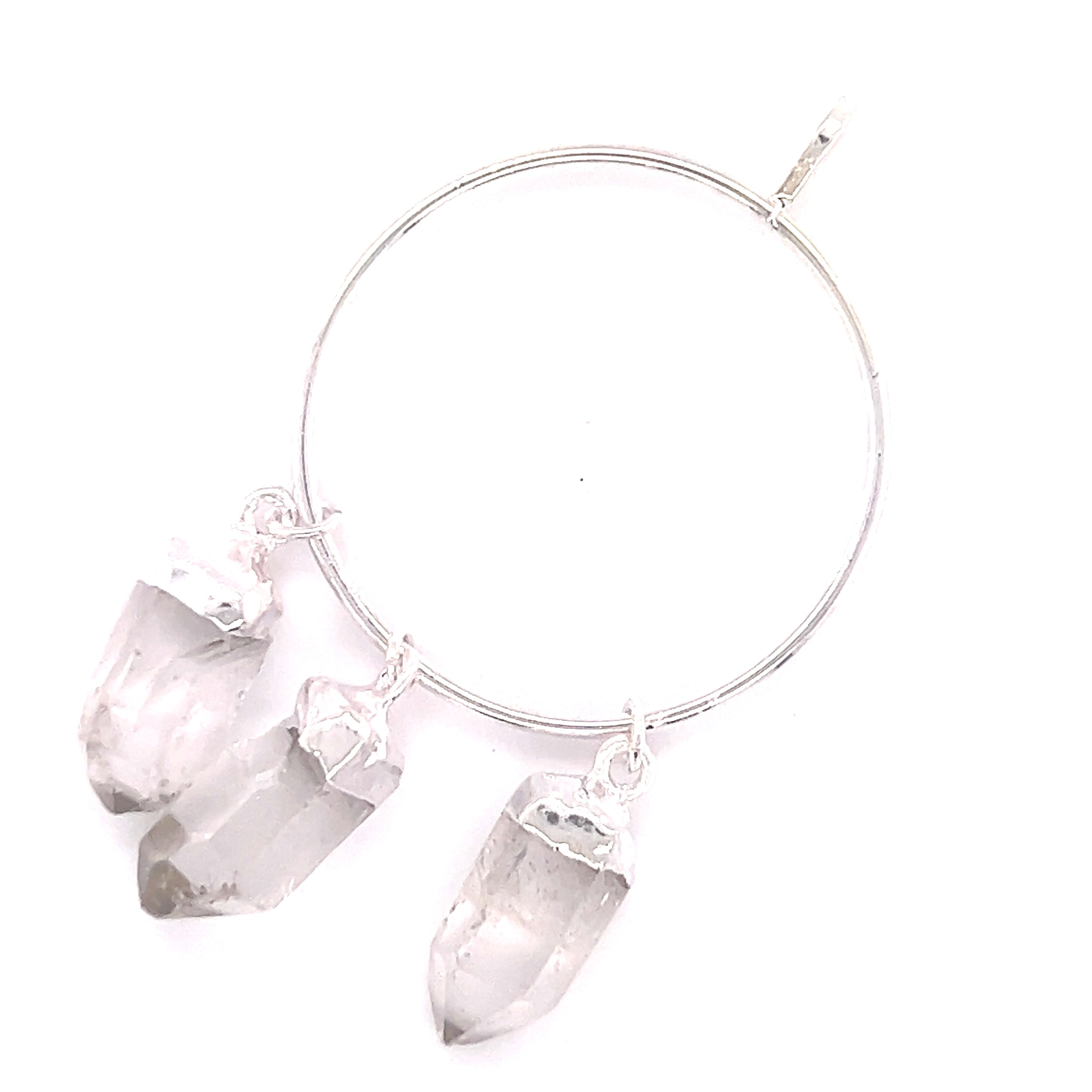A Super Silver hoop adorned with three Raw Quartz on Ring Pendants, perfect for everyday layering.