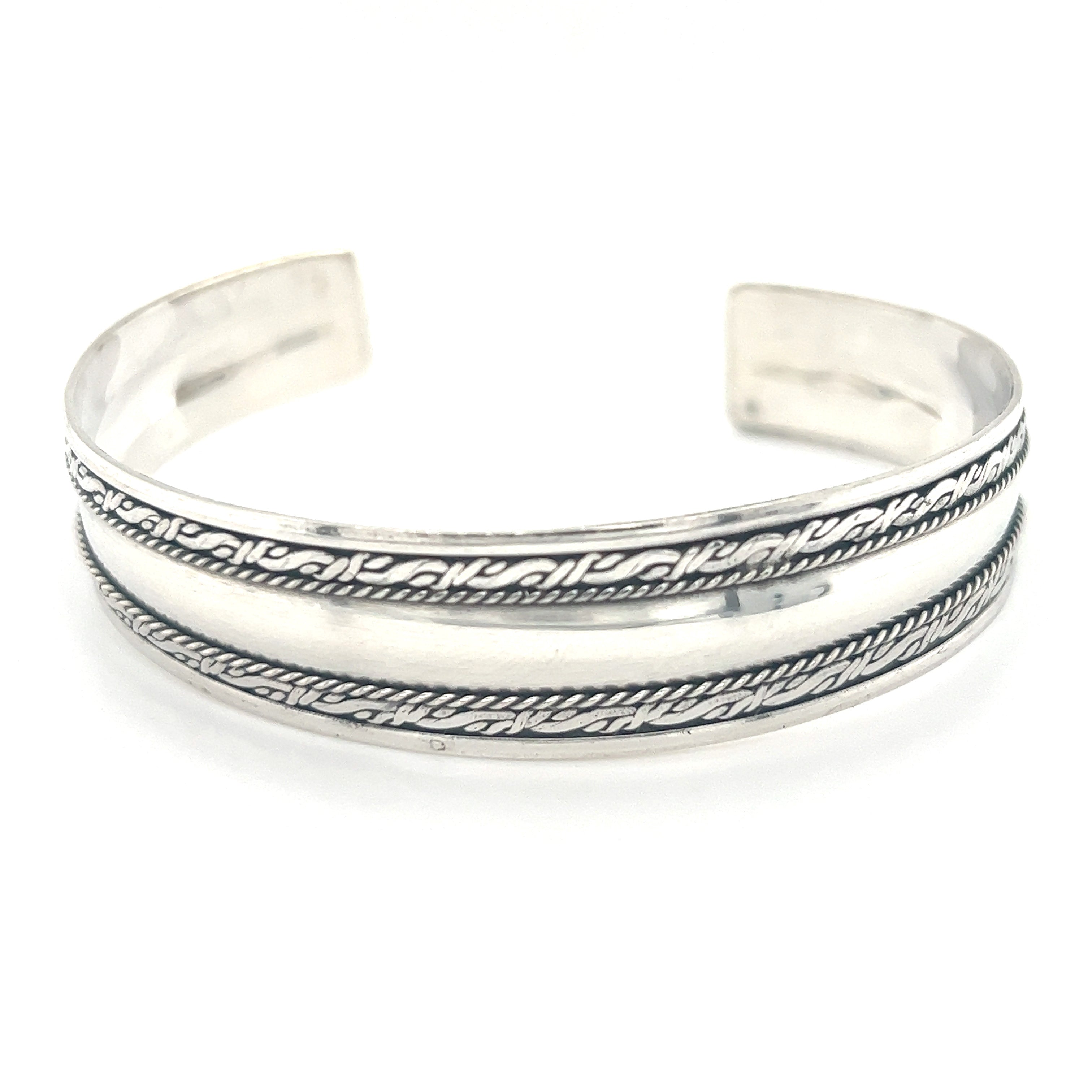 A Super Silver handmade Silver Domed Cuff with Rope Pattern, perfect for stacking or adding a touch of Bali-inspired style to your look.