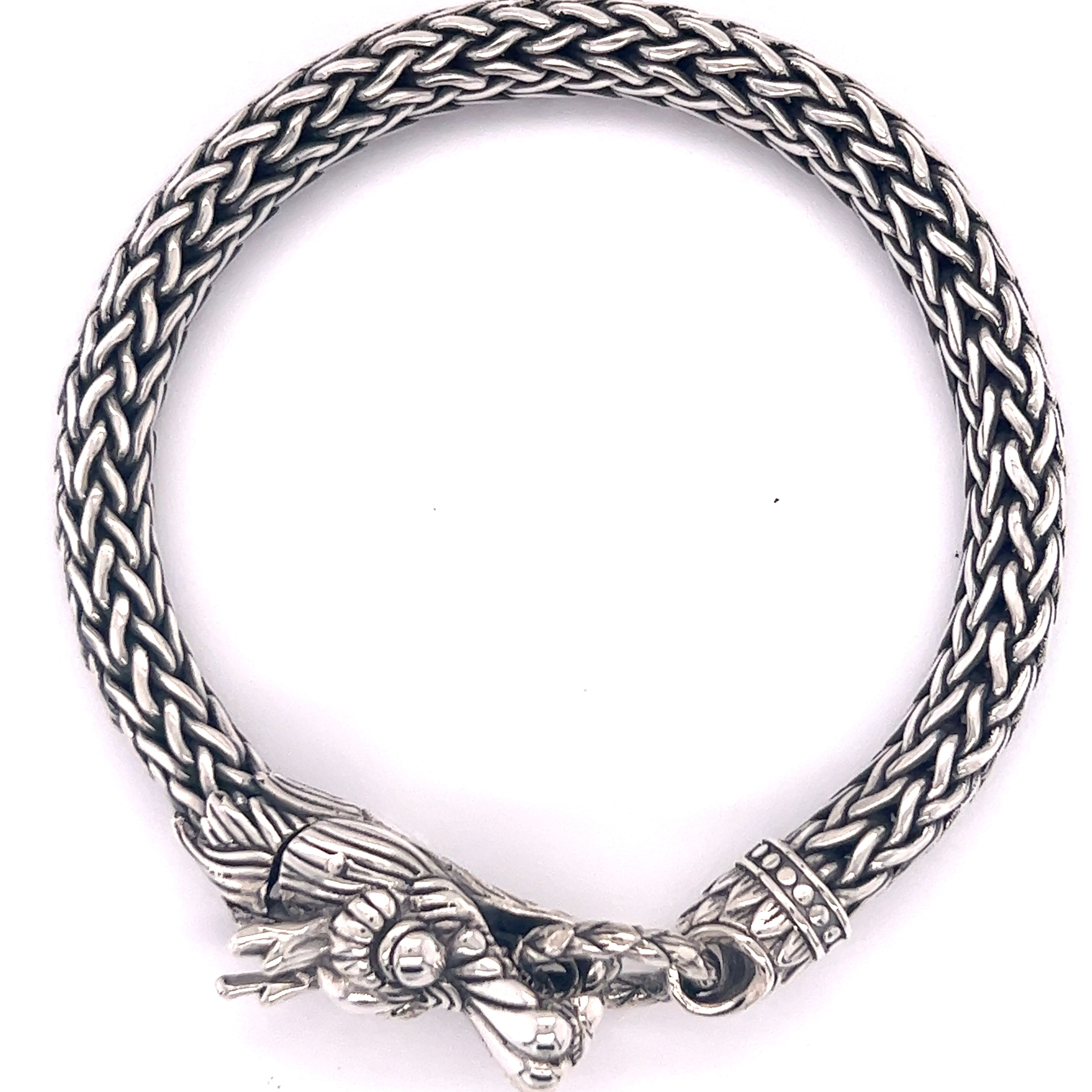 A heavy-duty Super Silver Sterling Silver Braided Rope Bracelet with Dragon Head clasp.