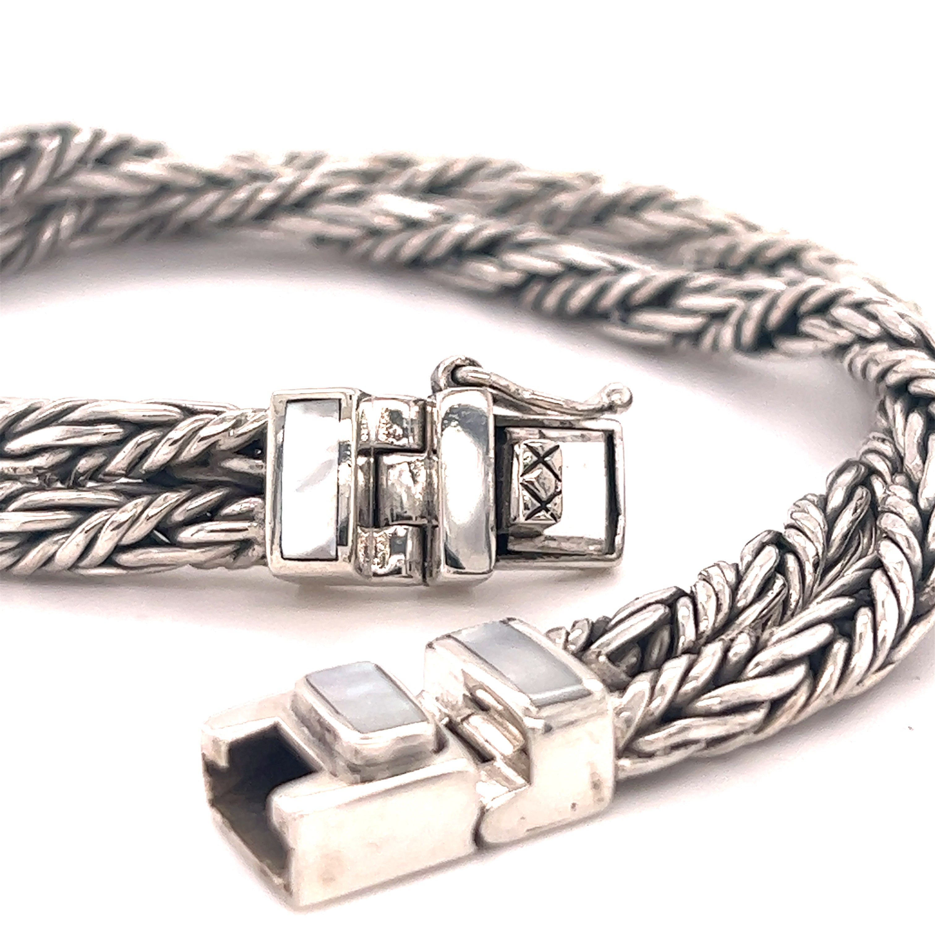 A Super Silver Double Twisted Braided Rope Bracelet with two clasps.