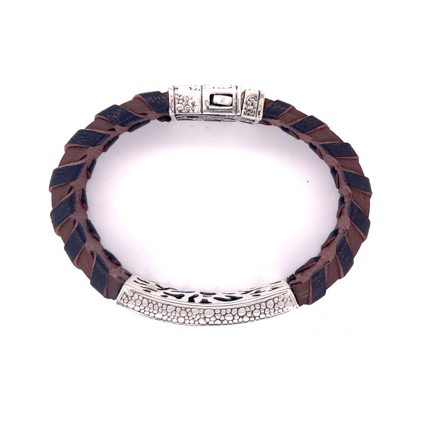 
                  
                    A Tribal Leather Bracelet with sterling silver and diamond accents by Super Silver.
                  
                