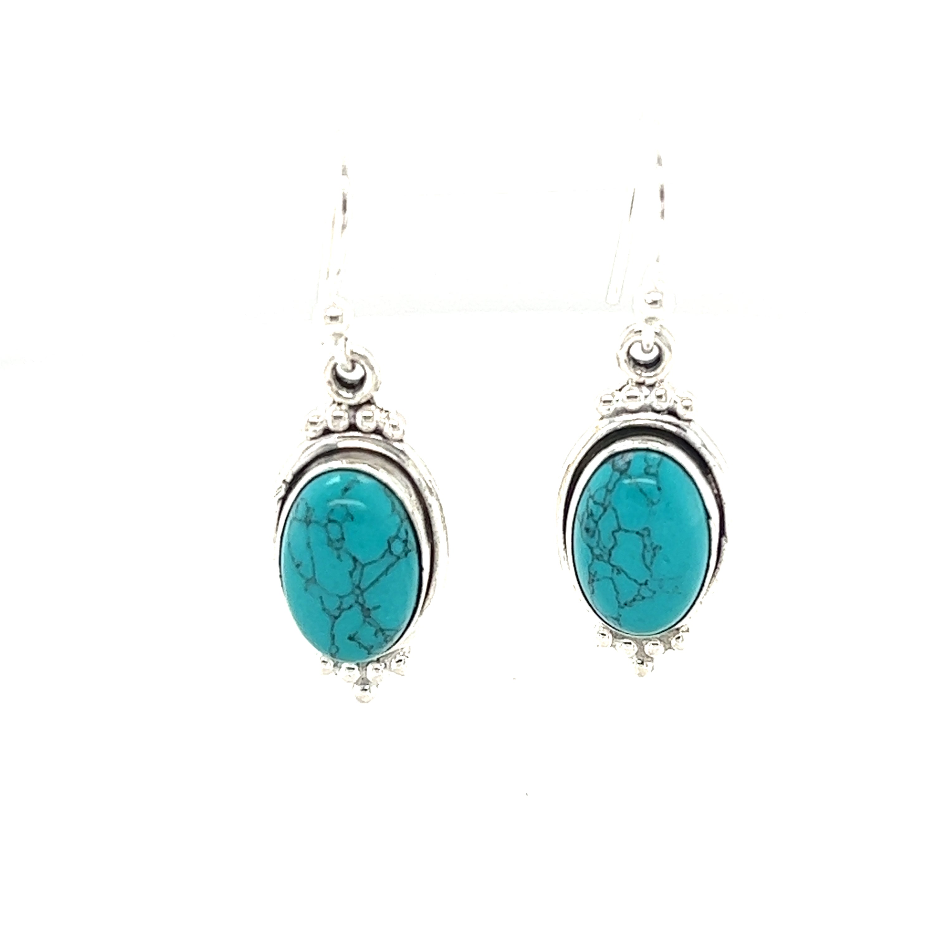 Natural gemstone earrings made from sterling silver with turquoise stones have been replaced with Super Silver's Natural Gemstone Earrings with a Raised Oval Setting.