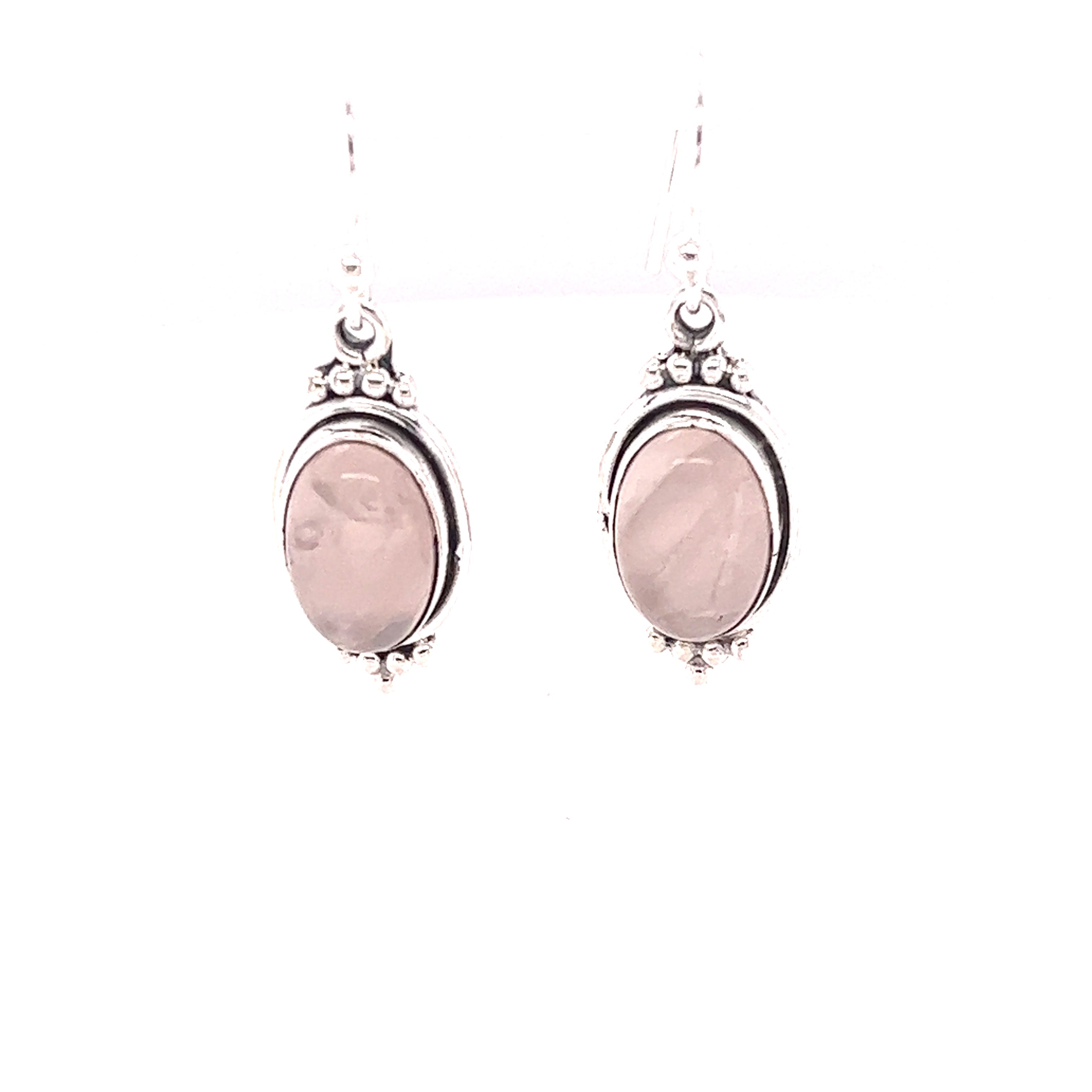 These Super Silver natural gemstone earrings feature a beautiful rose quartz stone and are crafted with sterling silver.