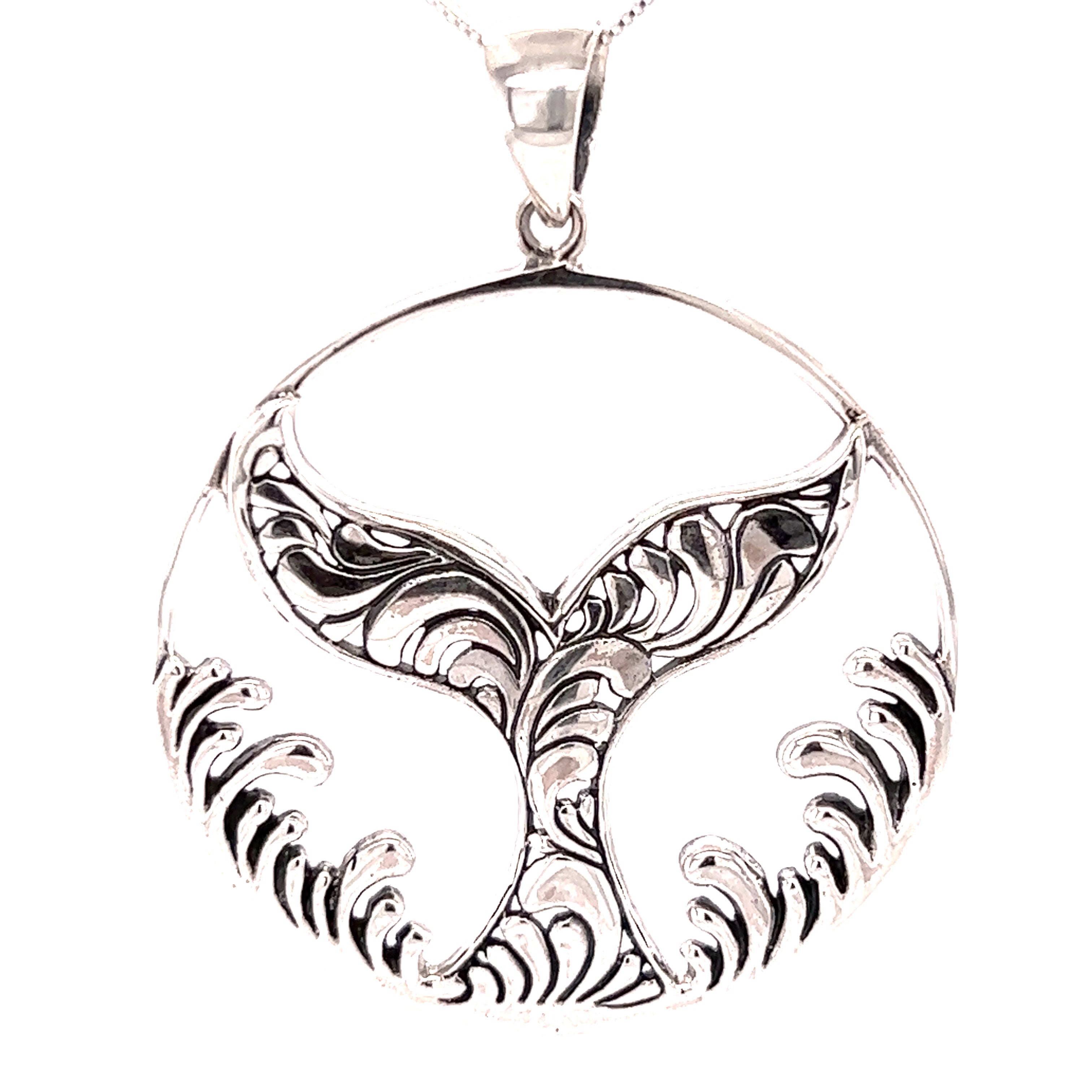 A Super Silver Magnificent Whale Tail Pendant with Waves, perfect for ocean enthusiasts and residents of Santa Cruz.