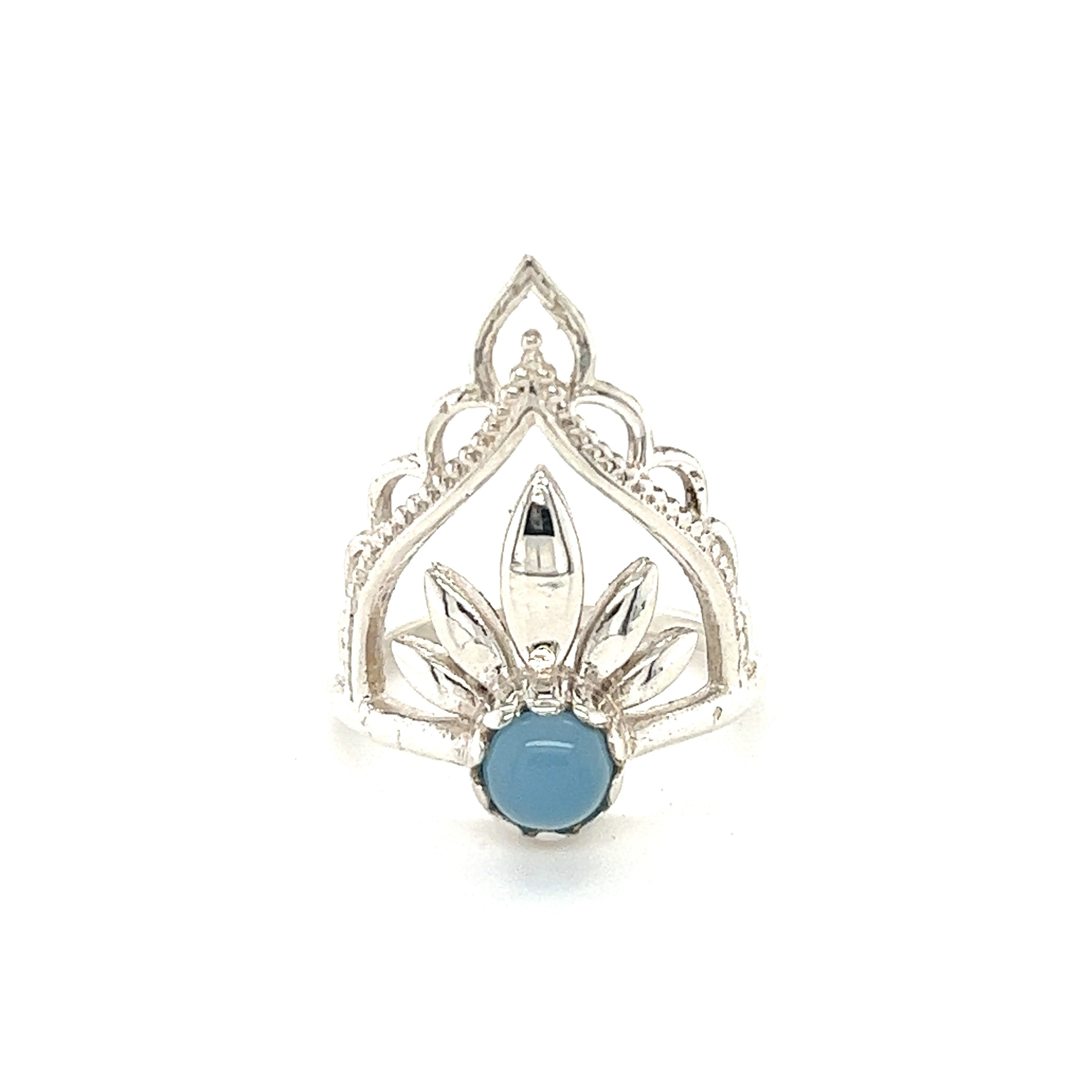 A Mandala Flower Crown Ring with Natural Gemstones with a cabochon stone.