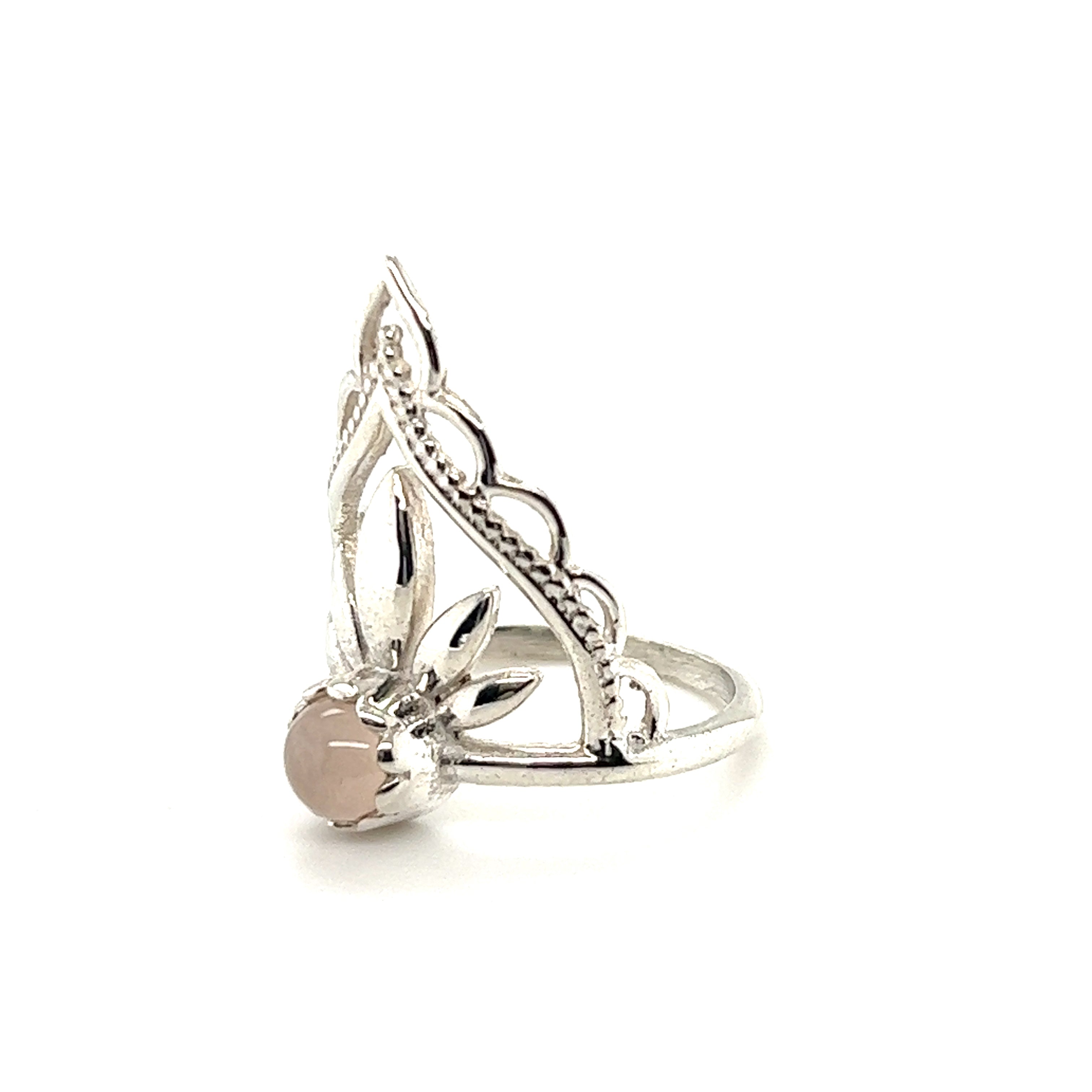 A Super Silver Mandala Flower Crown Ring with Natural Gemstones, with a pink natural gemstone gleaming in the center.