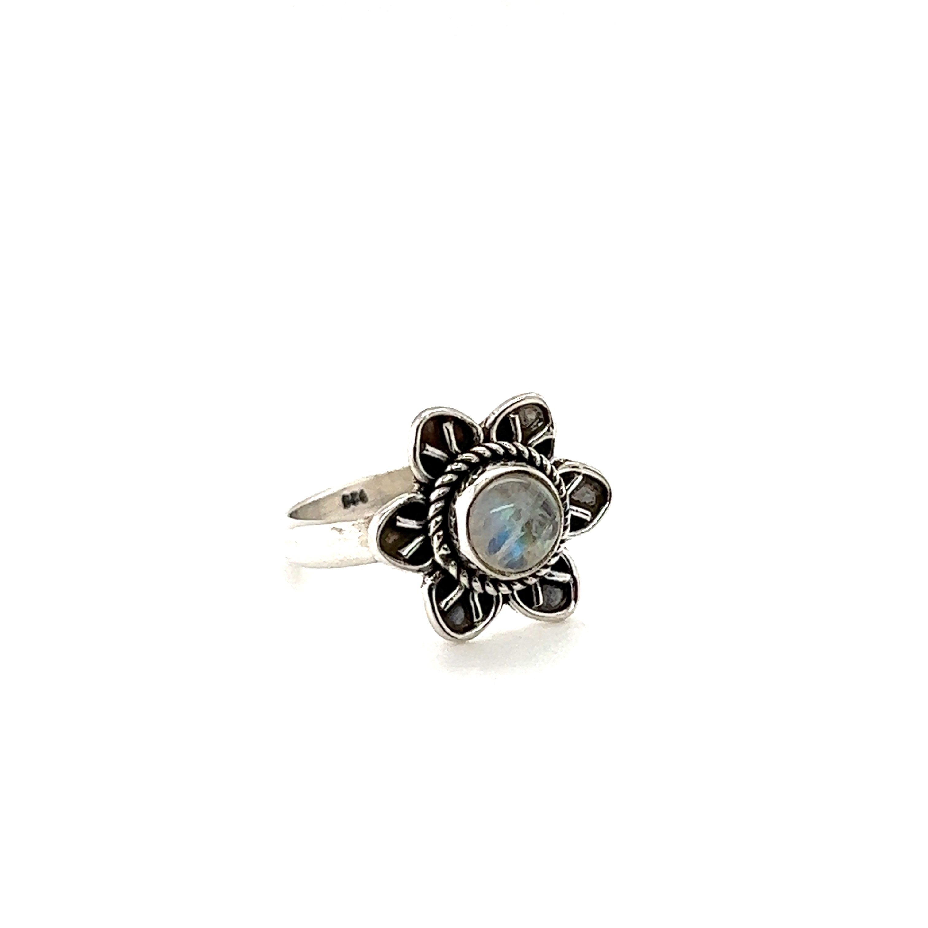 An Enchanting Flower Ring with Natural Gemstones with a labradorite stone.