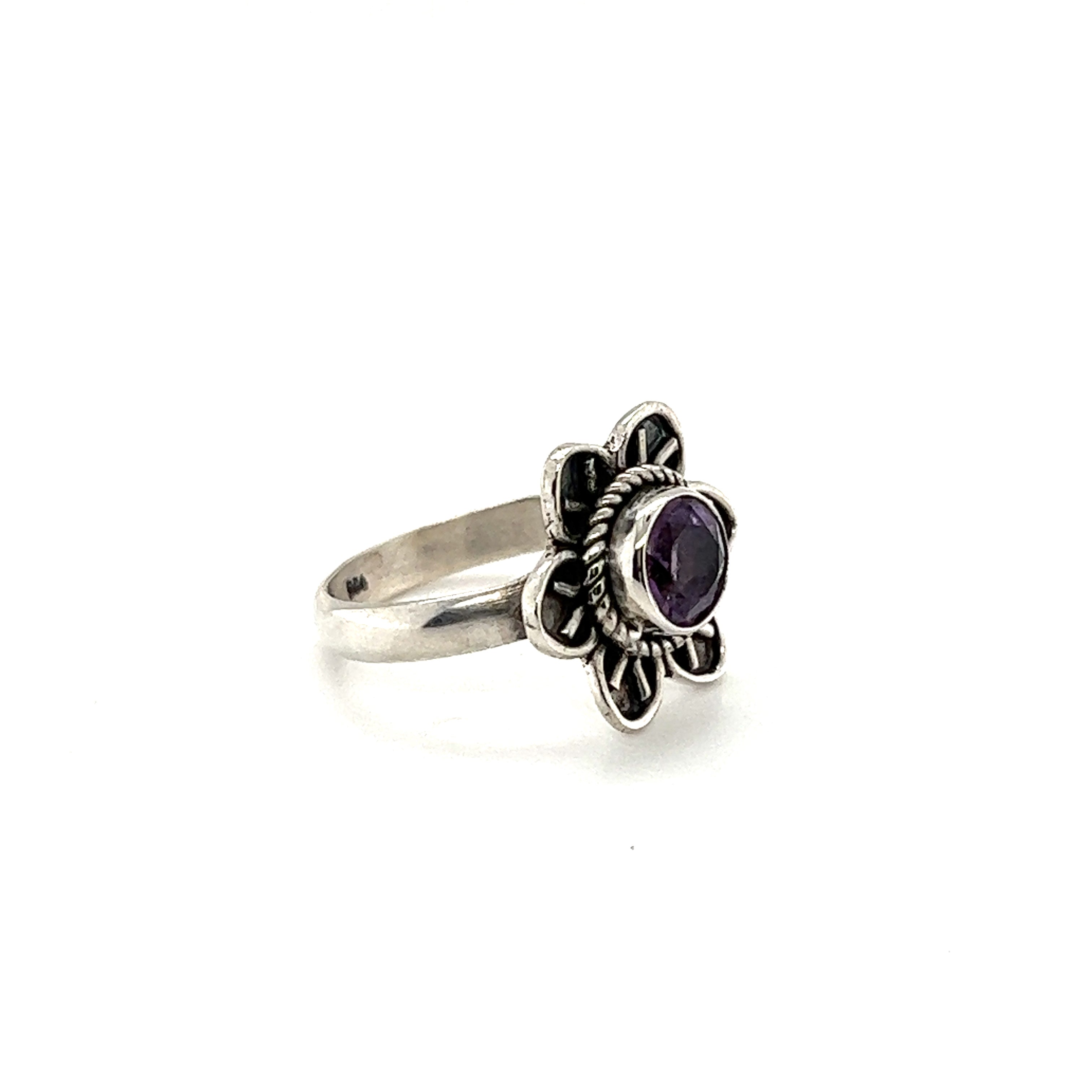 An Enchanting Flower Ring with Natural Gemstones by Super Silver on a white background.