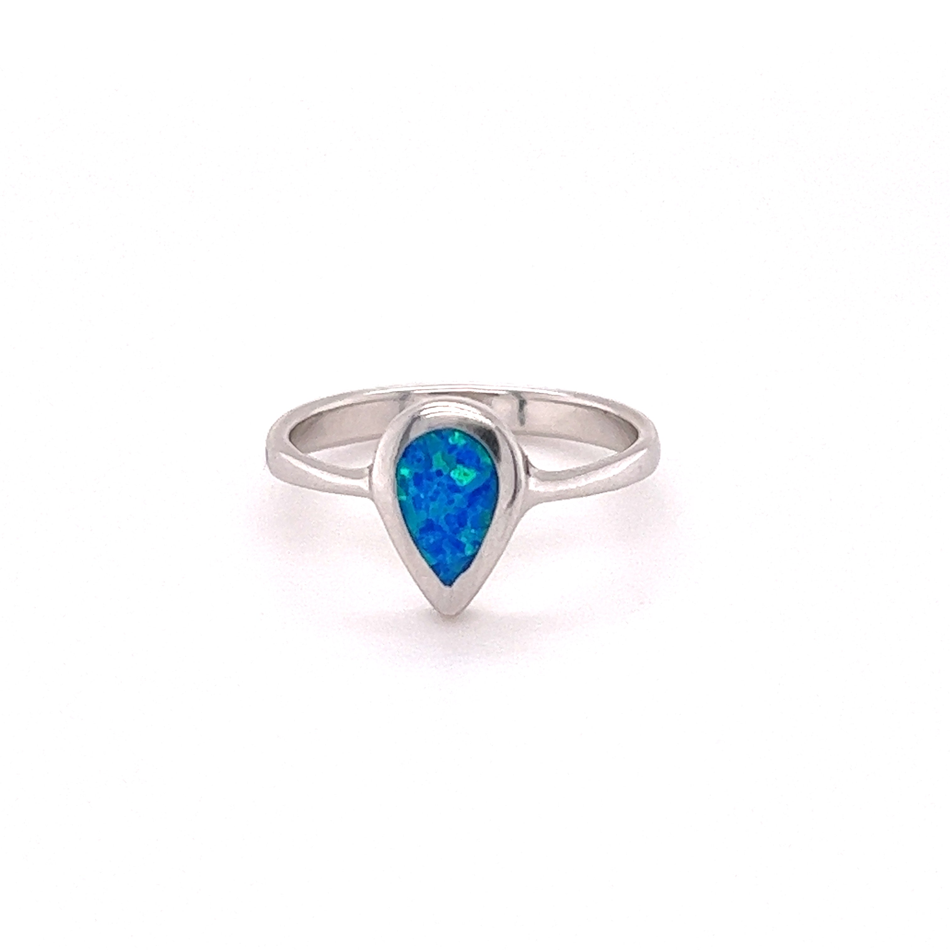 An exquisite Super Silver Teardrop Shaped Opal Ring is adorned with a mesmerizing blue opal stone, radiating elegance and sophistication.