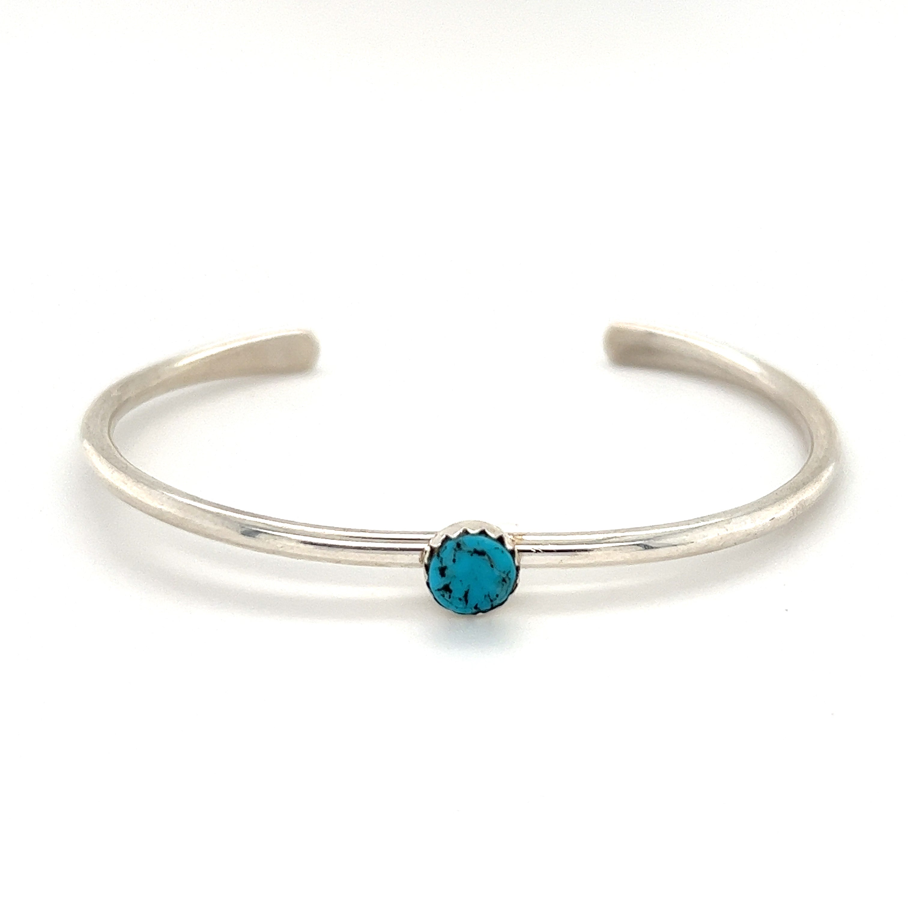 A Stackable Native American Turquoise Cuff bracelet with a Kingman Turquoise stone by Super Silver.