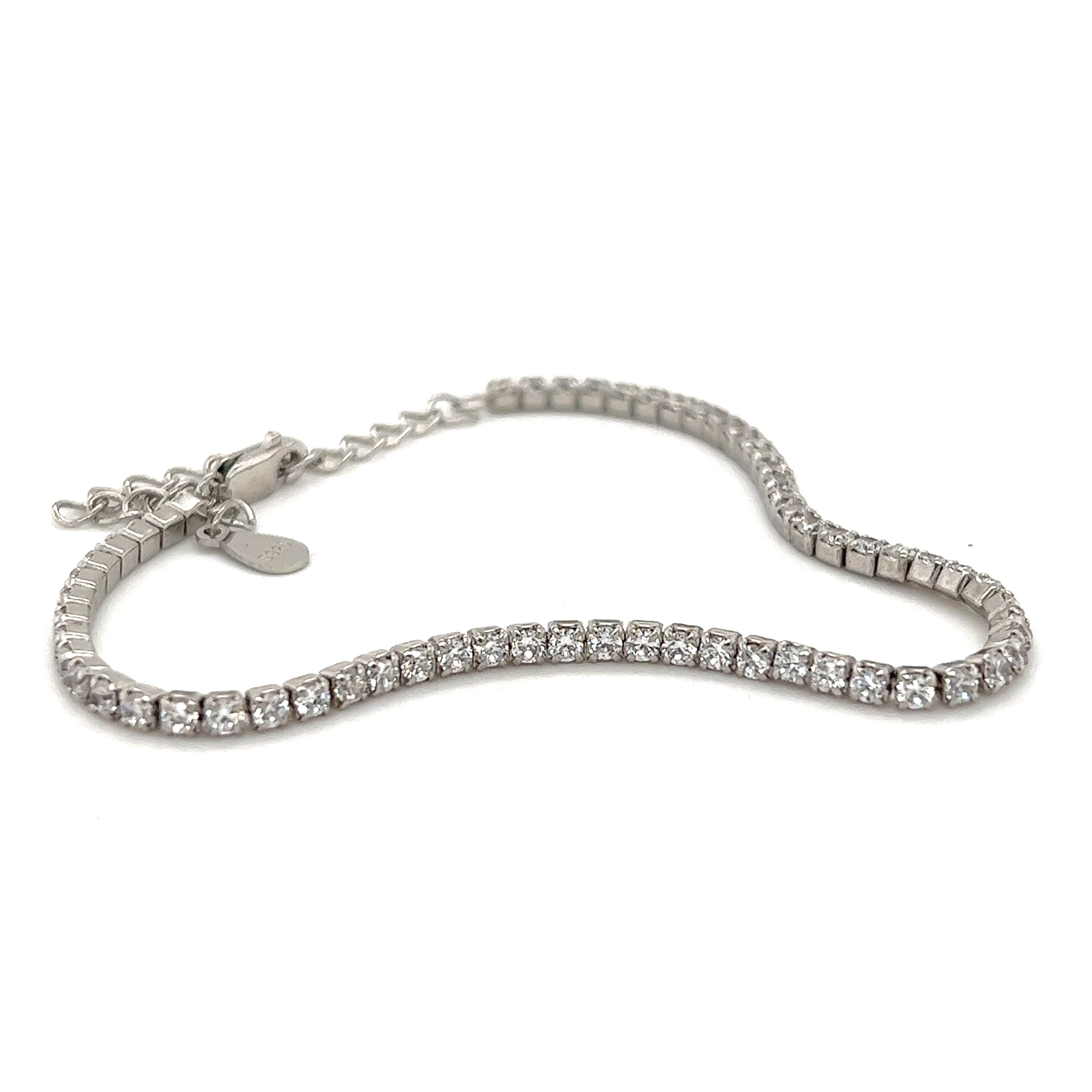 A sparkling Square Cubic Zirconia Tennis Bracelet adorned with a row of cubic zirconia, exuding elegance in Super Silver.