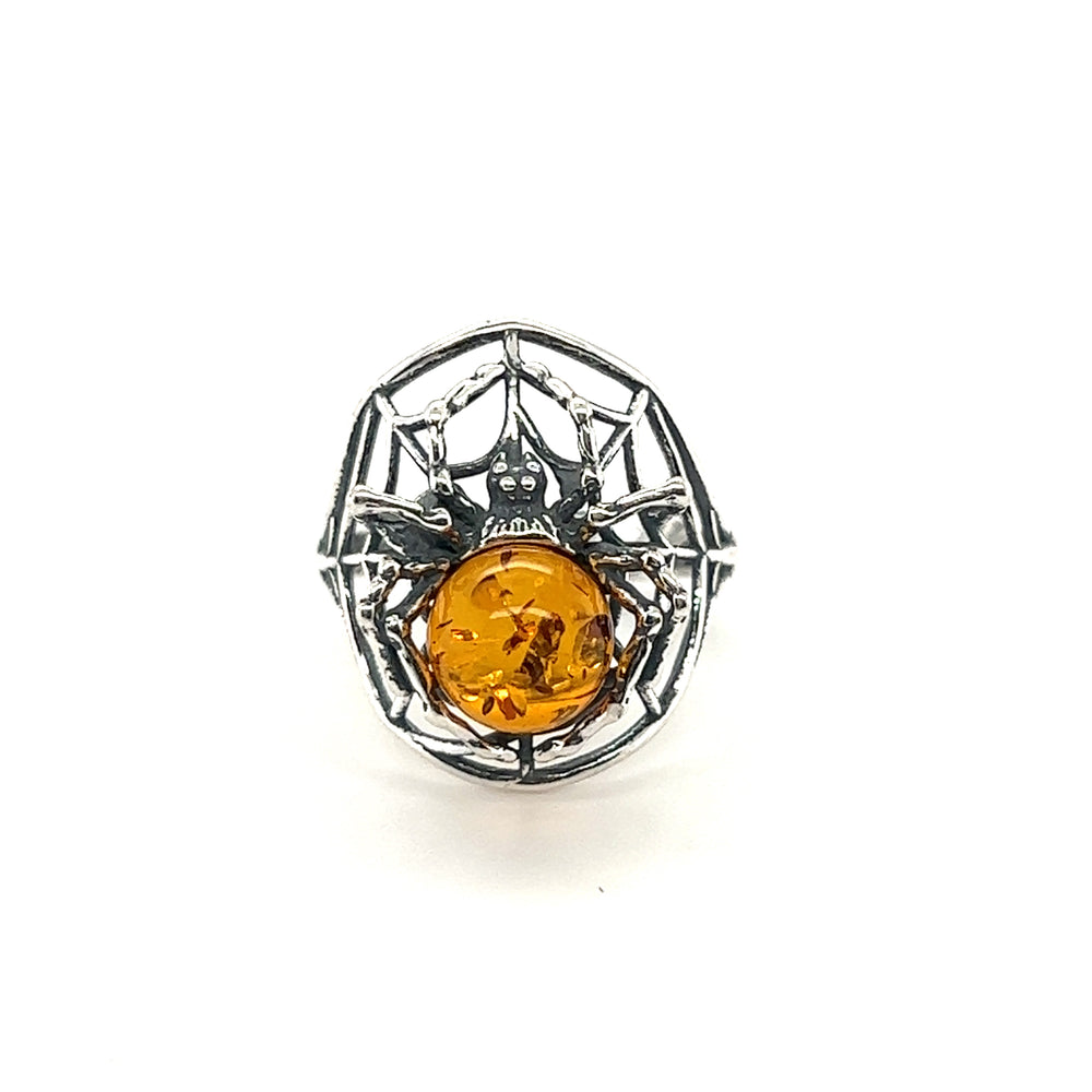 
                  
                    A Entrancing Adjustable Baltic Amber Spider Ring featuring a spider design with a large Baltic amber stone set in the center, on a white background.
                  
                