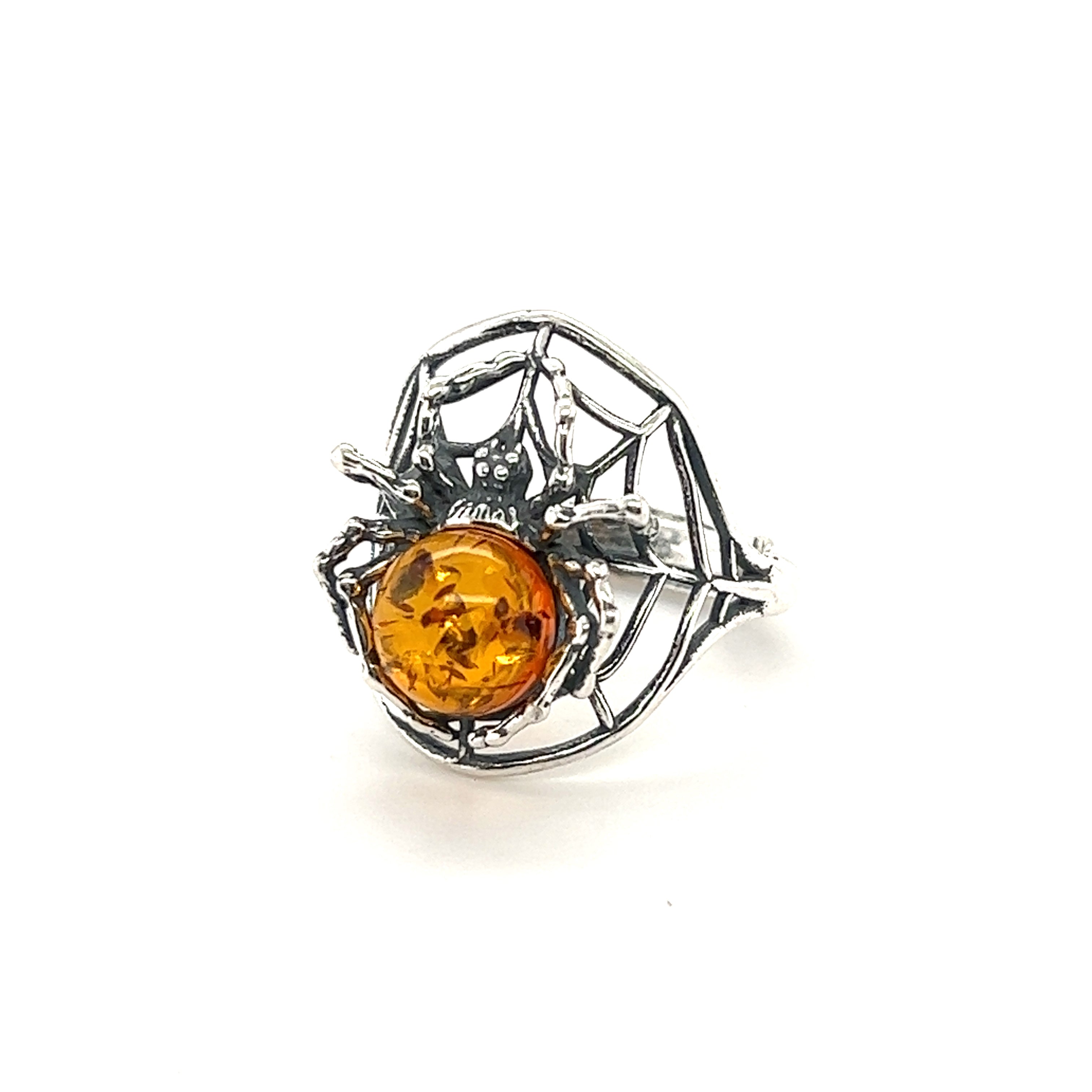 Entrancing Adjustable Baltic Amber Spider Ring featuring a spider design with a Baltic amber stone as the body, set against a white background.