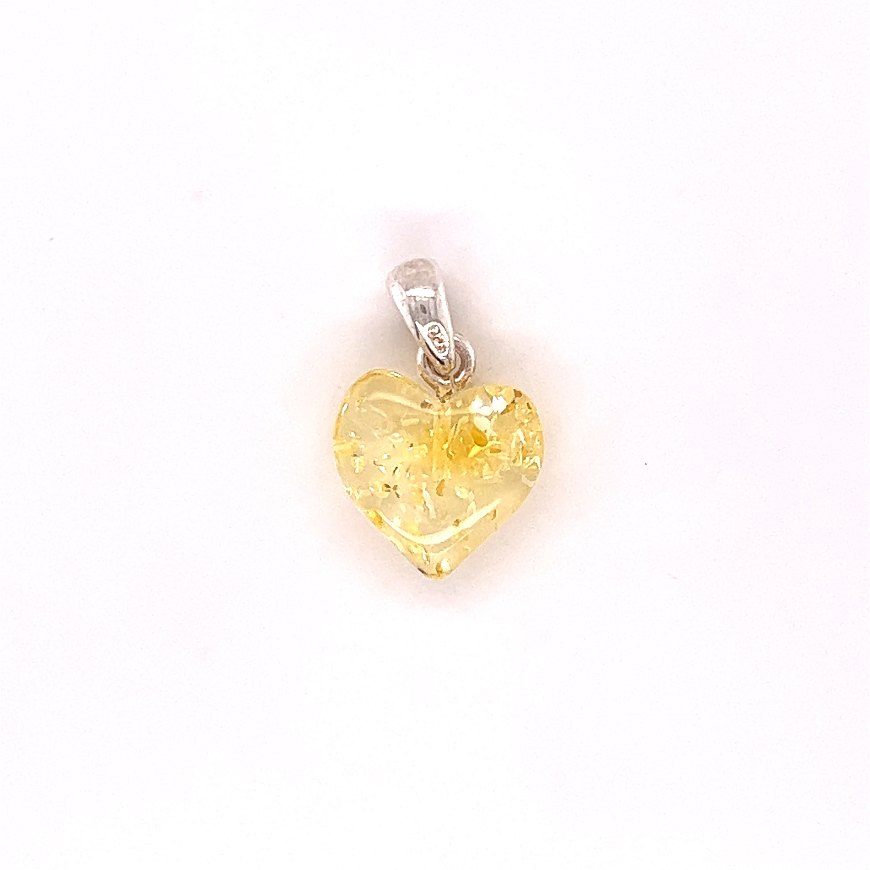 A small Charming Baltic Amber Heart Pendant on a .925 Super Silver background.