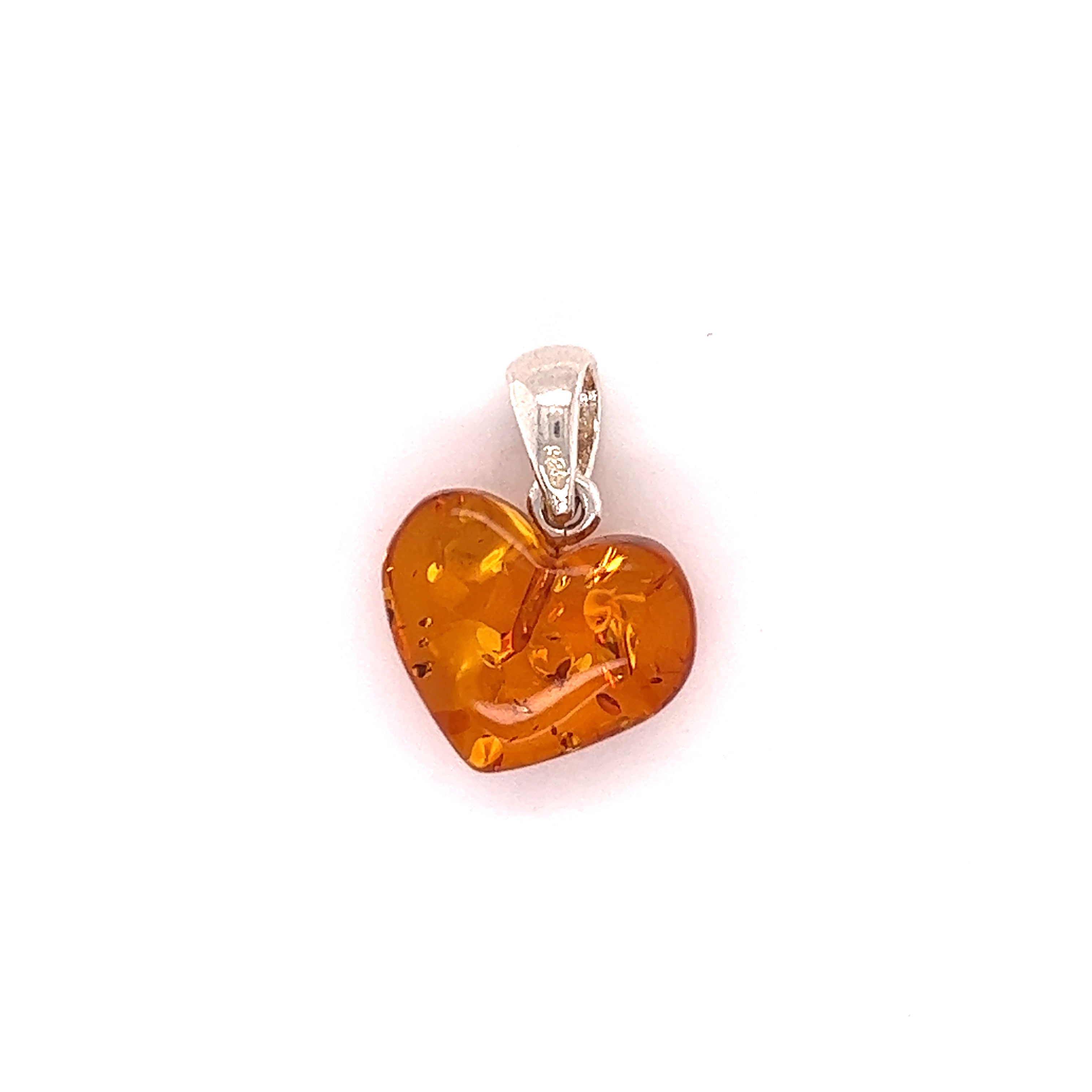 A Charming Baltic Amber Heart Pendant by Super Silver on a white background.