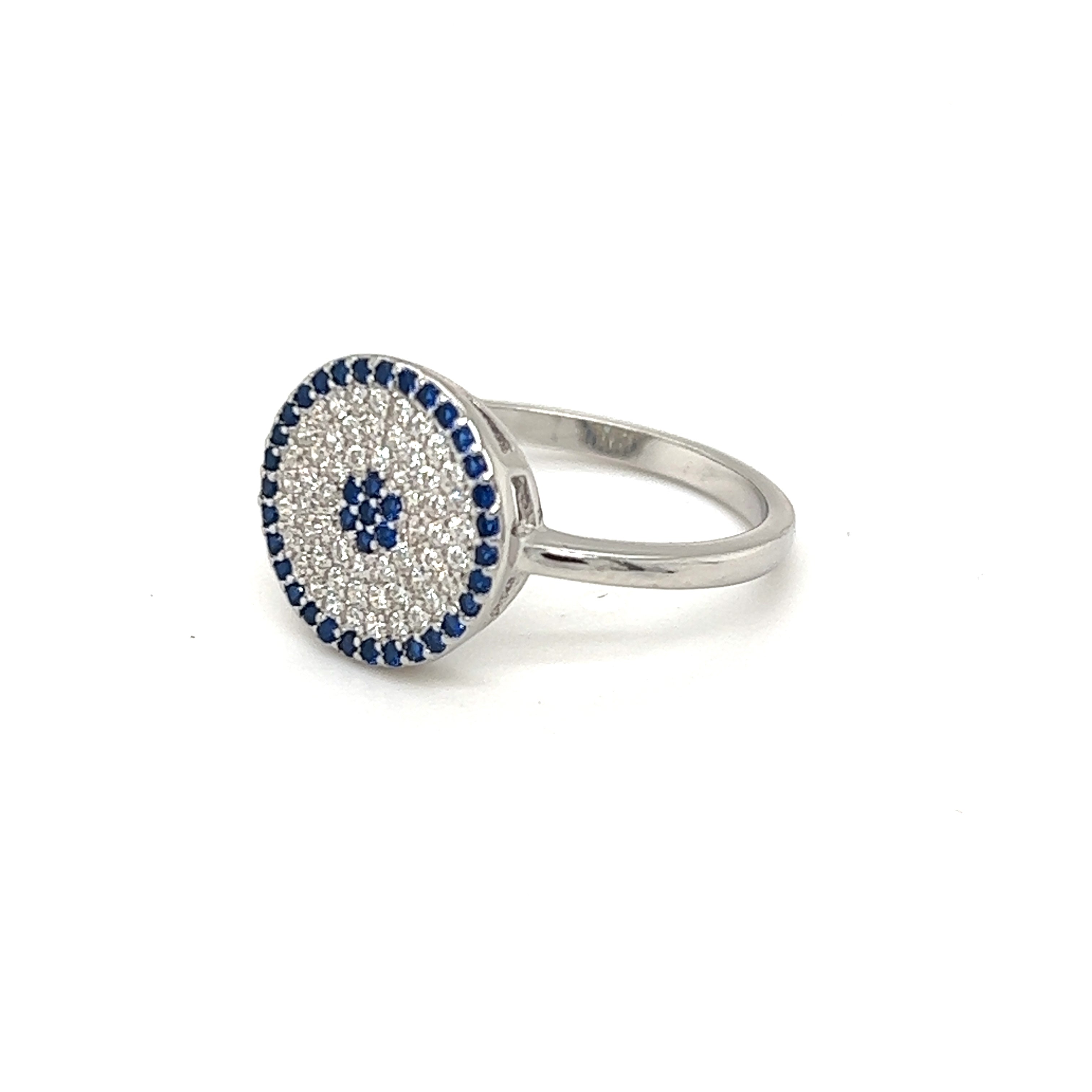 An elegant Cubic Zirconia Evil Eye Ring with blue and white diamonds.