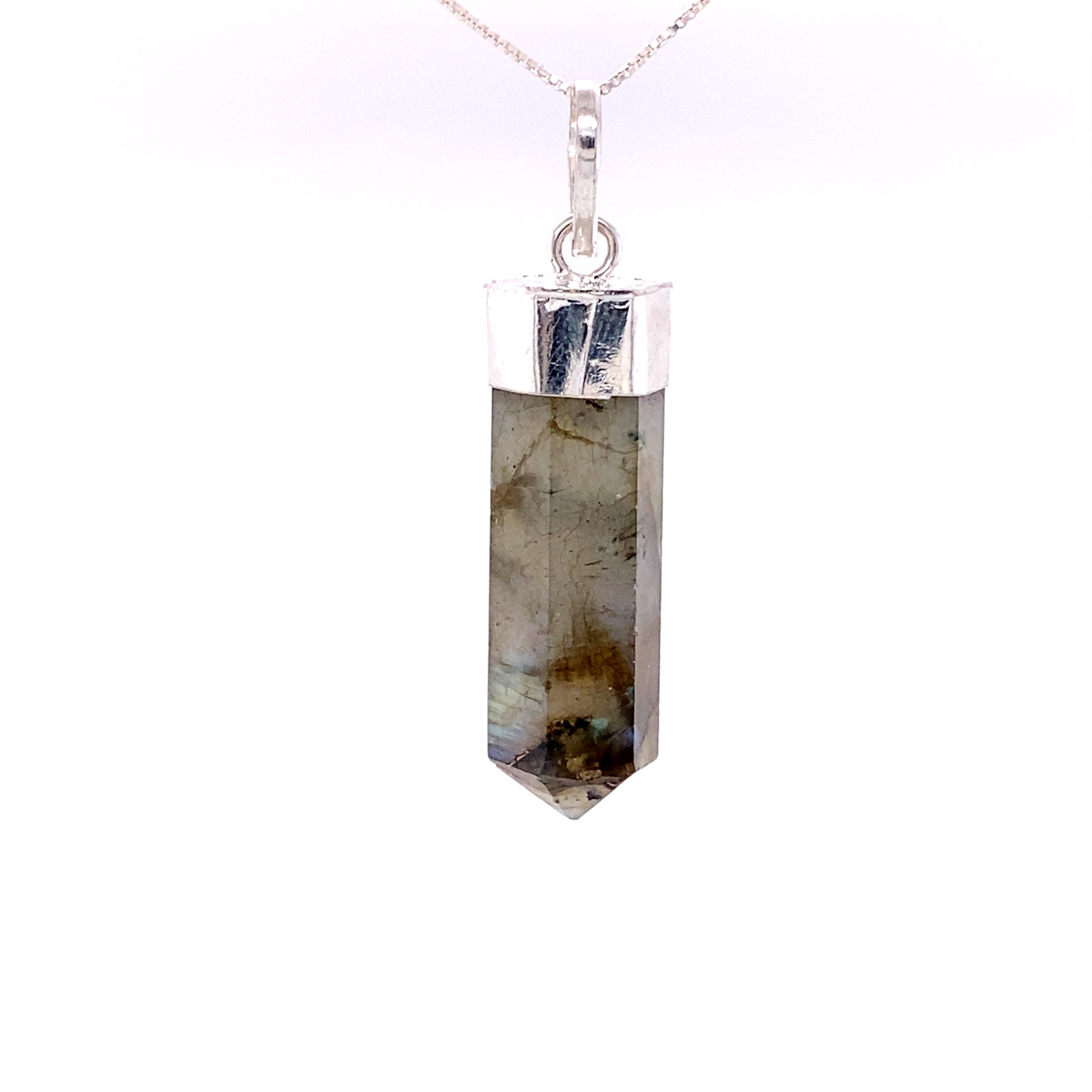 An obelisk-cut Simple Gemstone Point Pendant on a Super Silver chain, emitting a boho vibe.