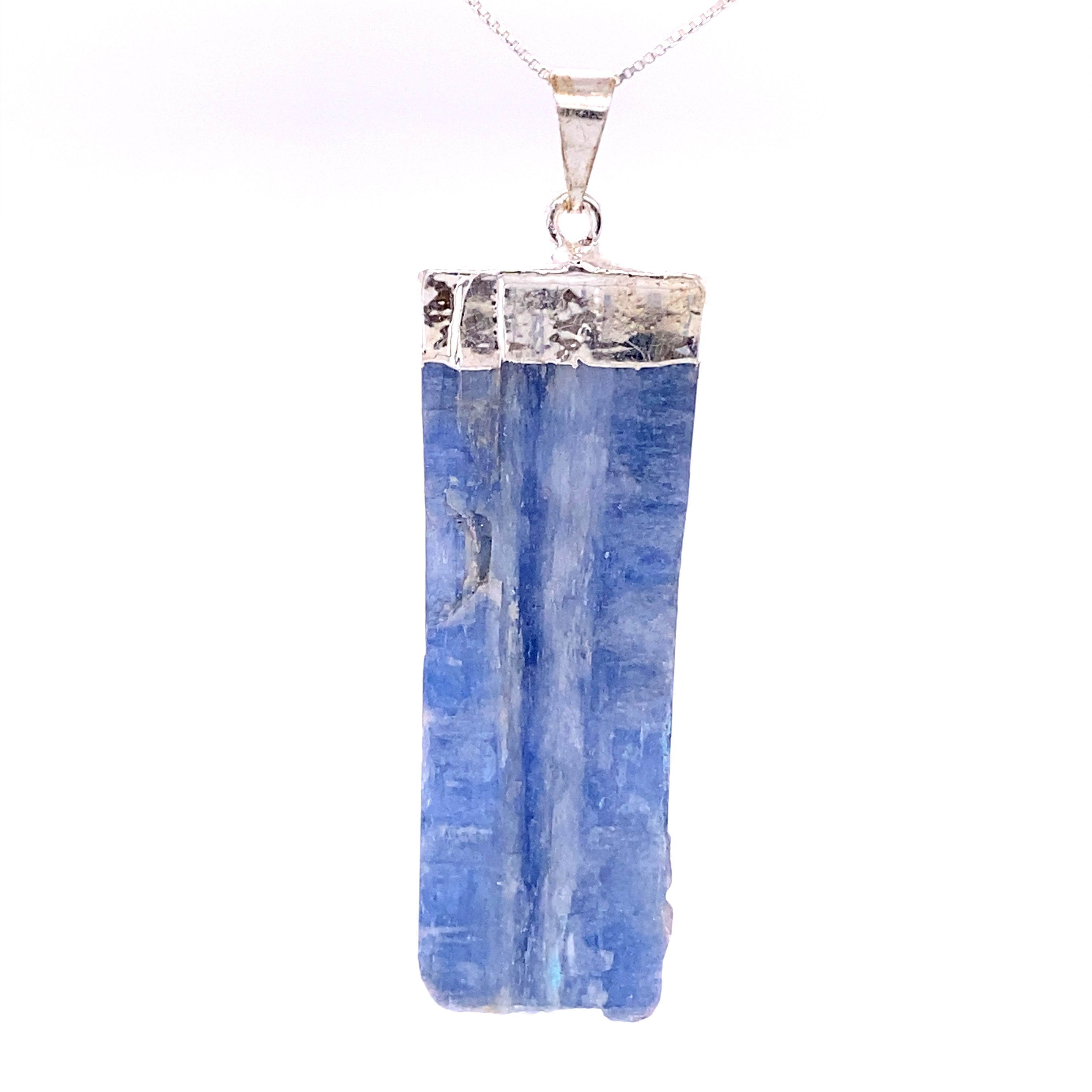 A Raw Crystal Pendant With Silver Cap on a Super Silver chain.