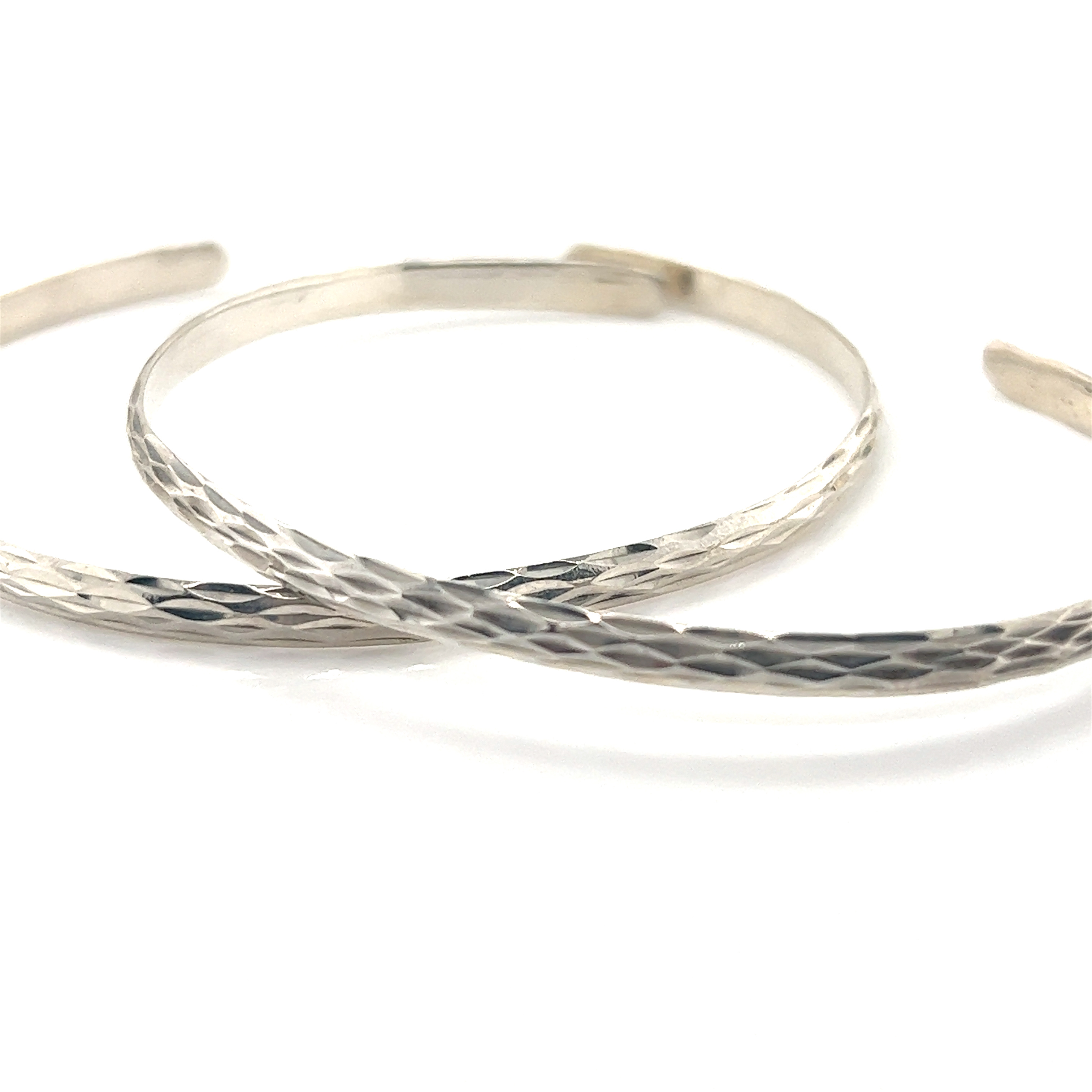 Glittering Diamond Cut Cuff Bracelet by Super Silver.