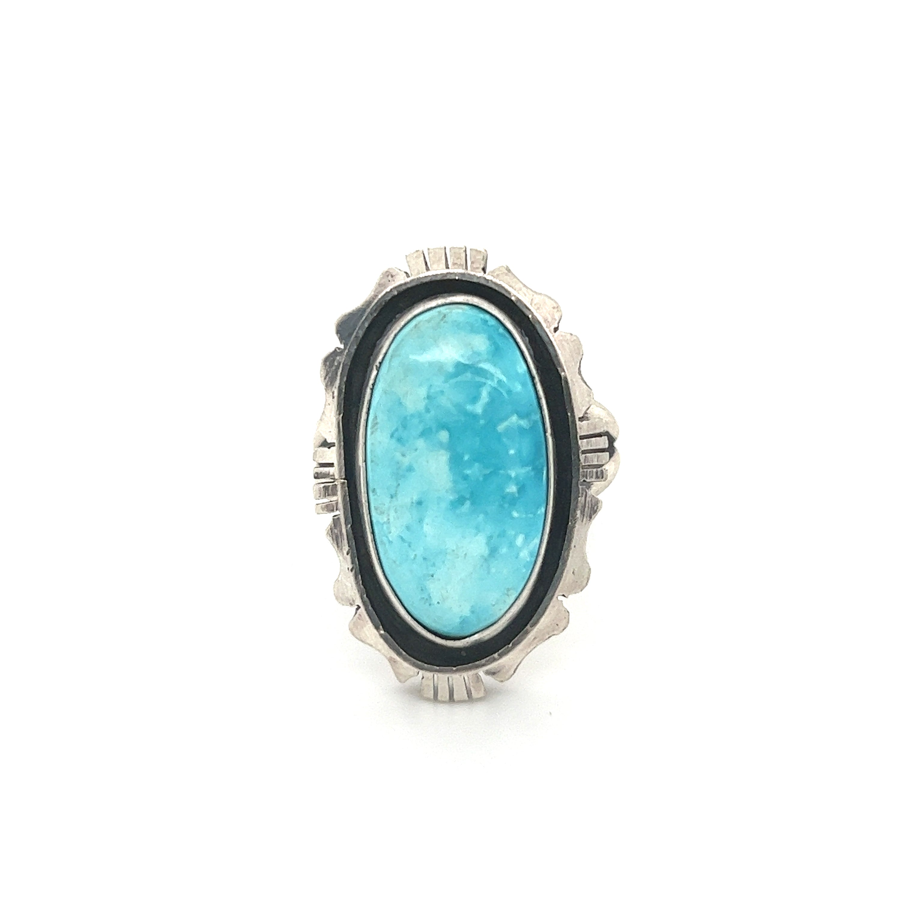 A sterling silver ring with a Stunning Native American Turquoise Ring.
