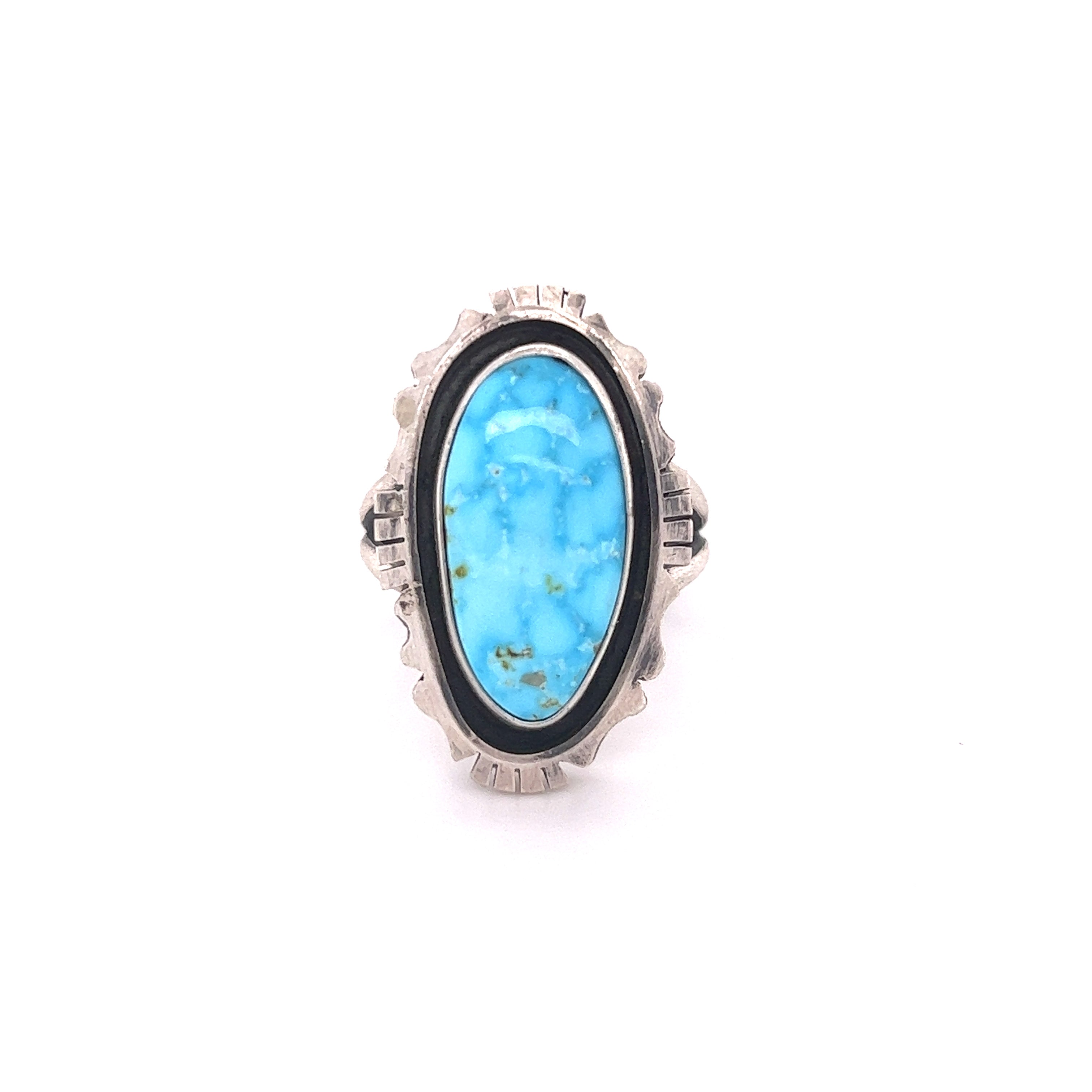 A stunning Native American Turquoise Ring with a turquoise stone.