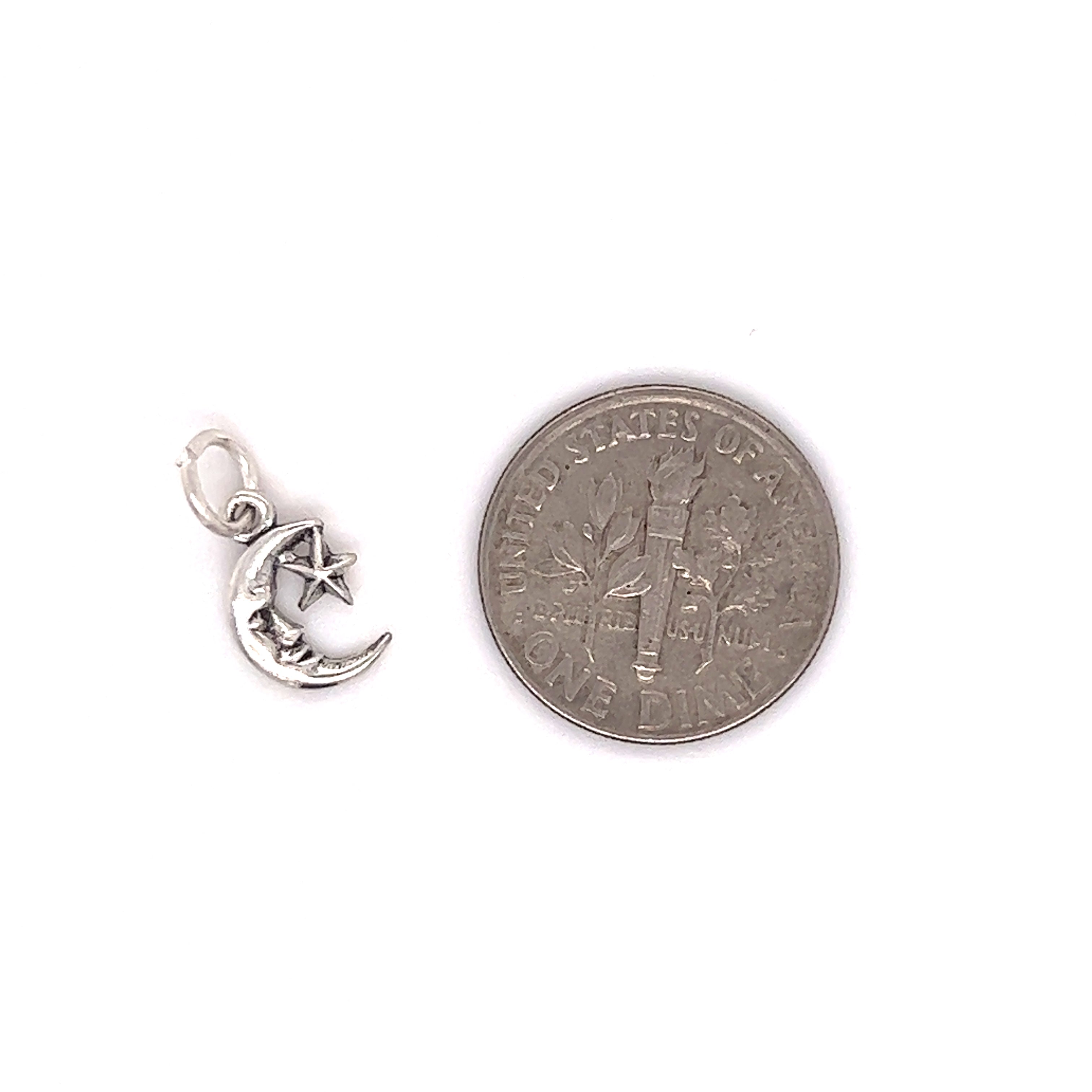 A Tiny Man in the Moon Star Charm by Super Silver, perfect for sky lovers or as an addition to a charm bracelet.