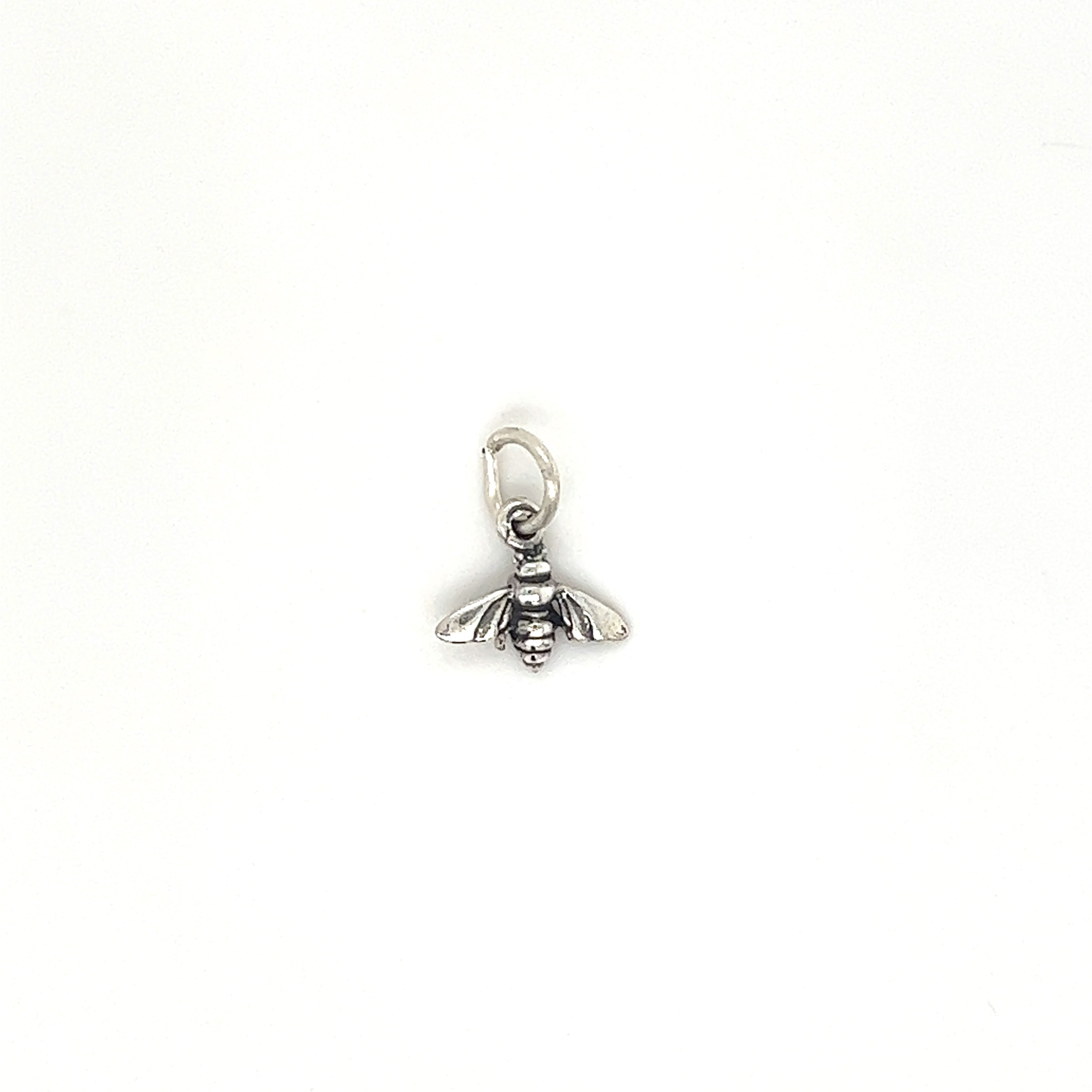 A Super Silver Tiny Bee Charm on a white background.