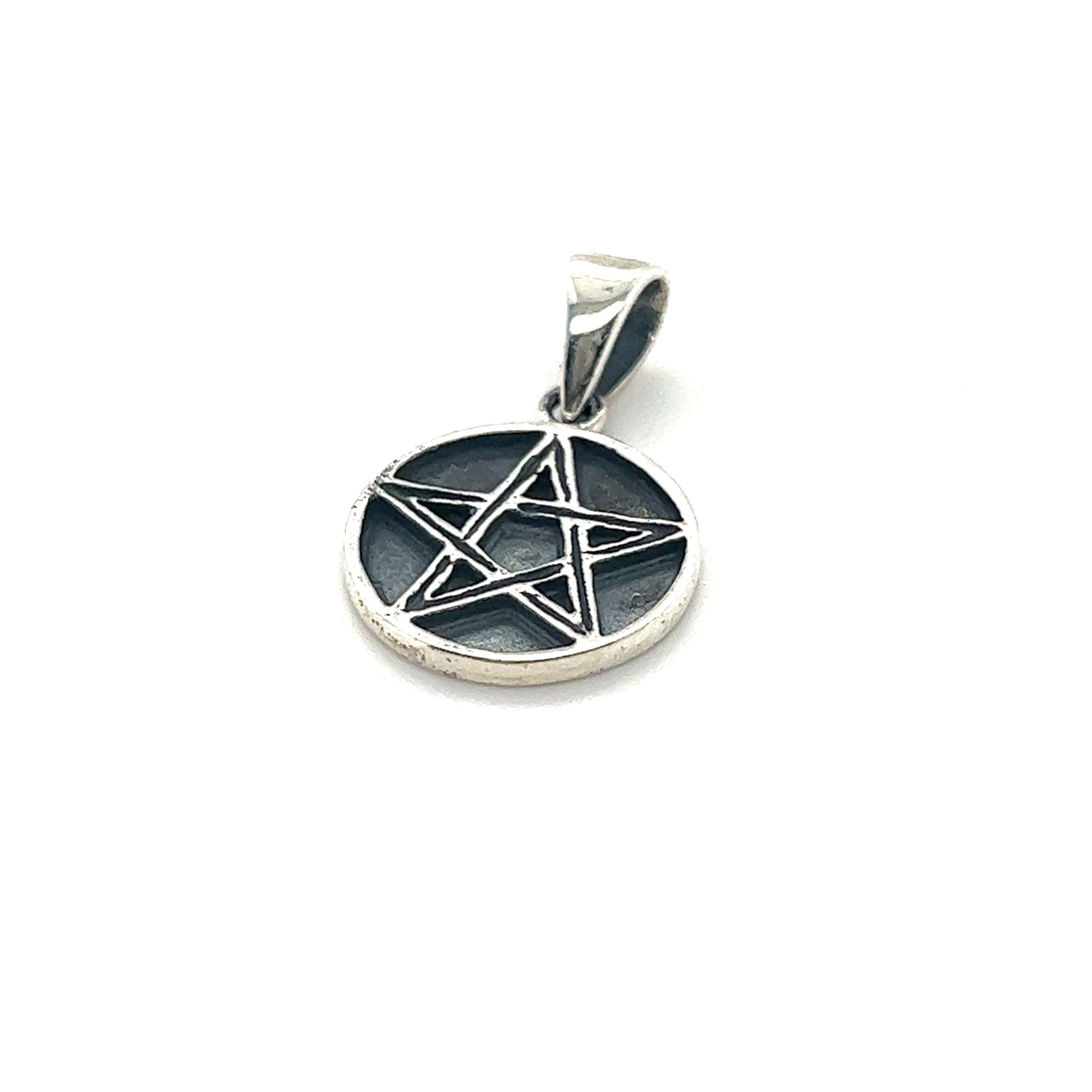 A Bewitching Delicate Pentagram Pendant with antique detailing on a white background. Perfect for Wiccans.