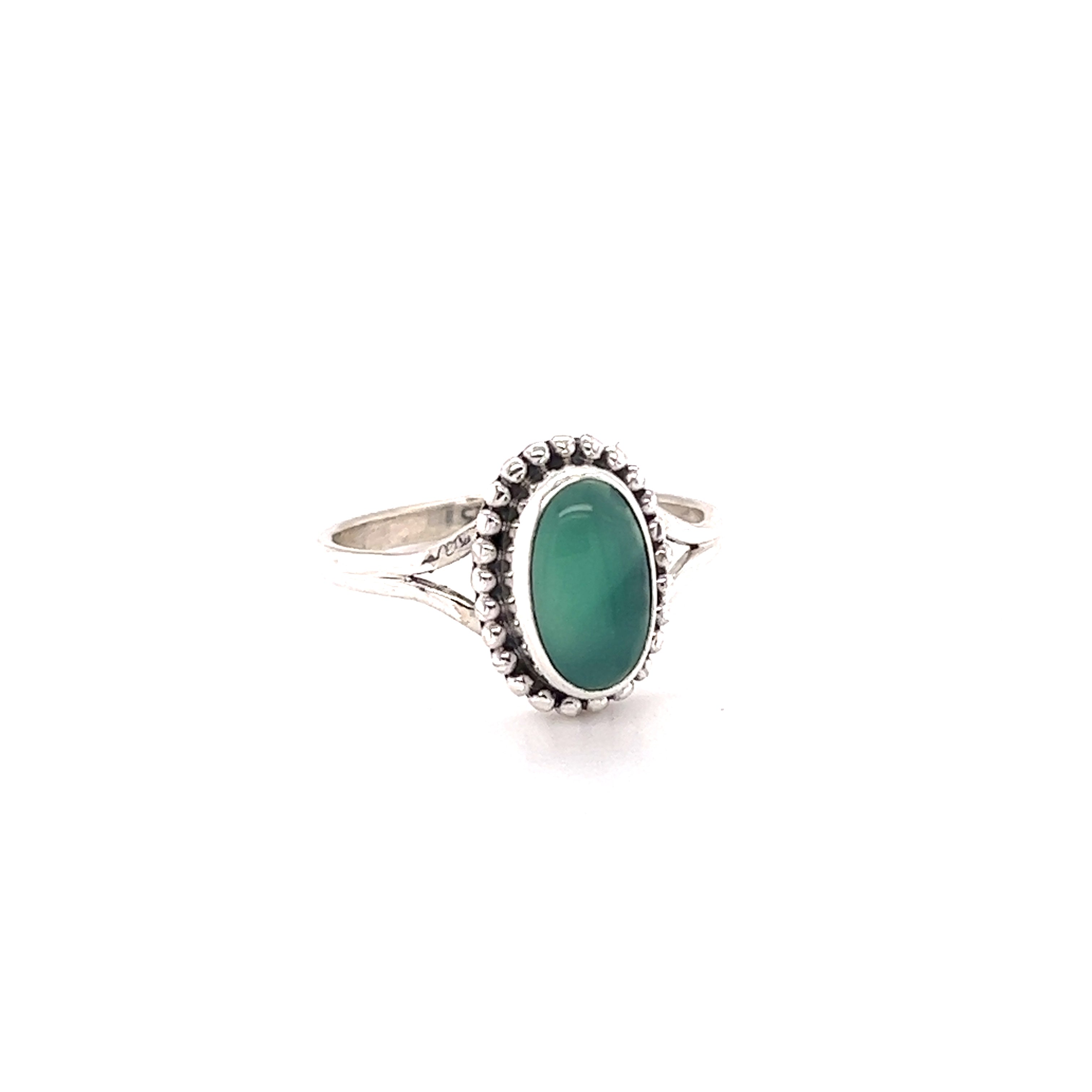 A silver ring with a Stylish Oval Gemstone Ring with Ball Border stone, perfect for hippies in Santa Cruz.