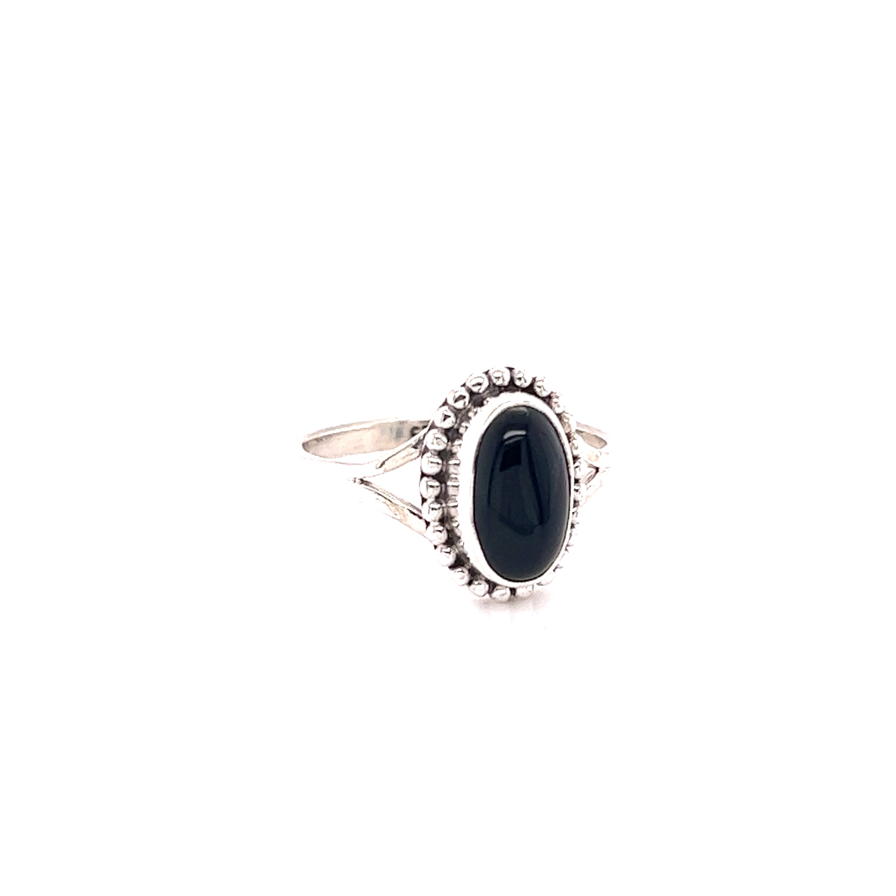 A Stylish Oval Gemstone Ring with Ball Border on a white background.