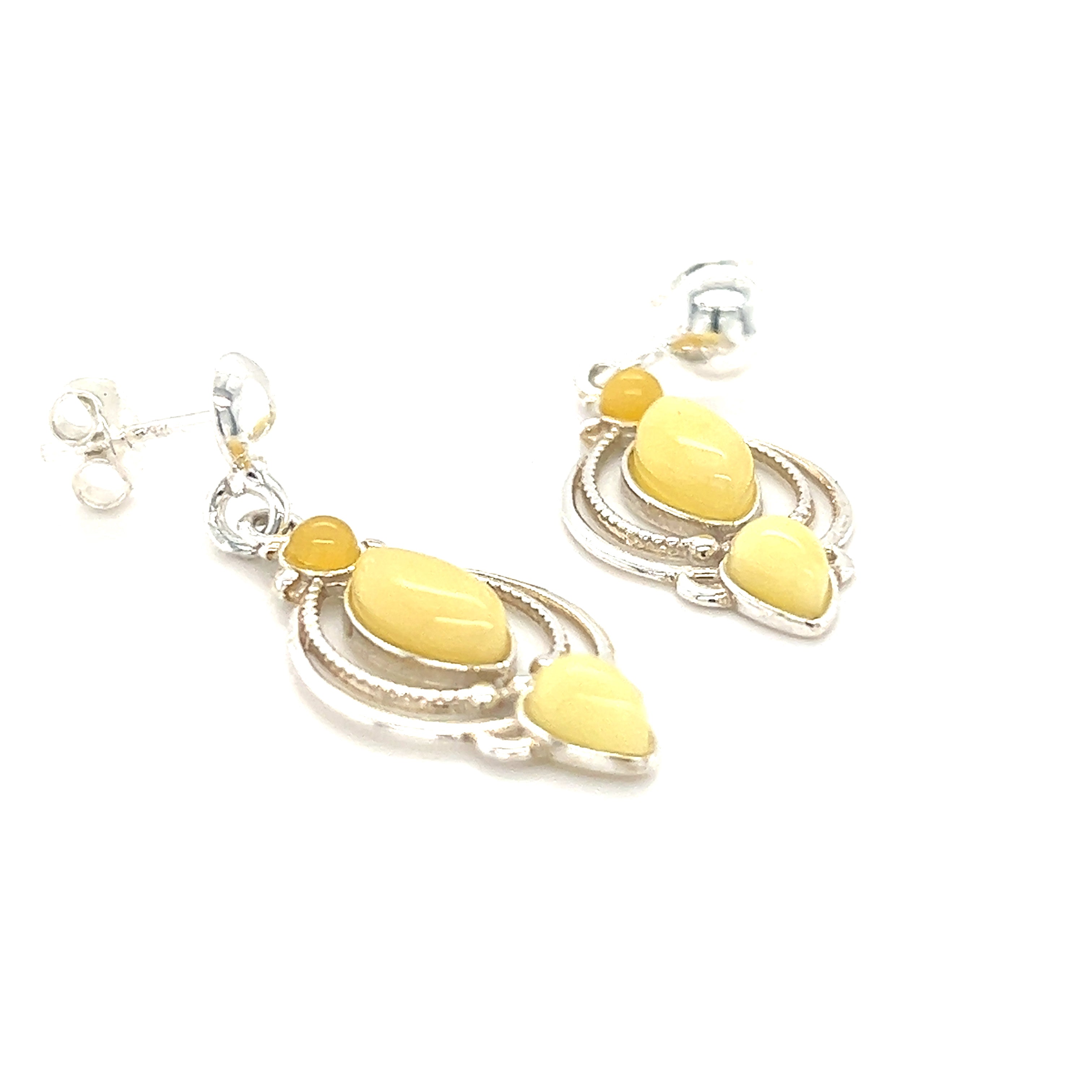A pair of Super Silver Fancy Marquise Shaped Baltic Amber Earrings on a white background.