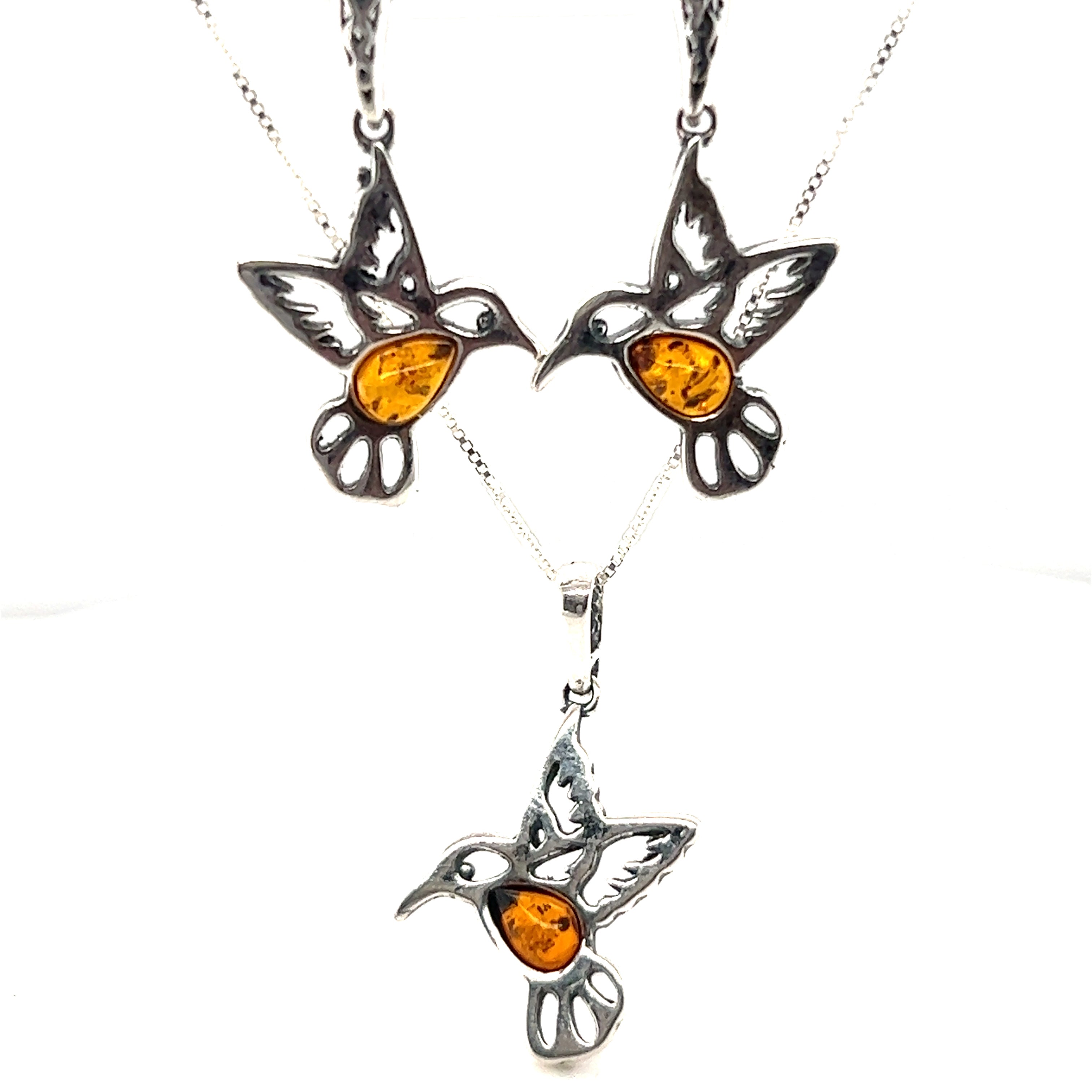 A Super Silver Amber Hummingbird pendant and earrings set, featuring delicate Amber Hummingbird-shaped earrings.