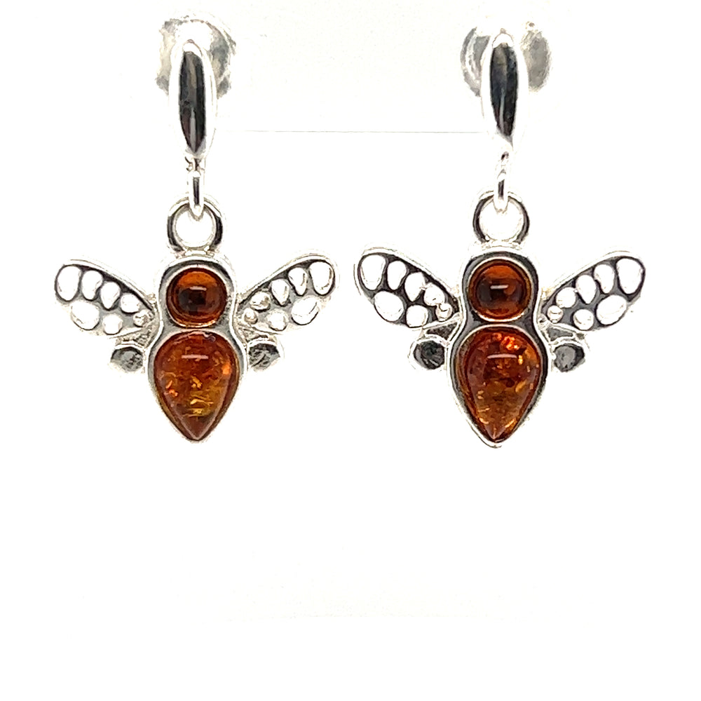 Cute Amber Bee Earrings adorned with delicate bees.