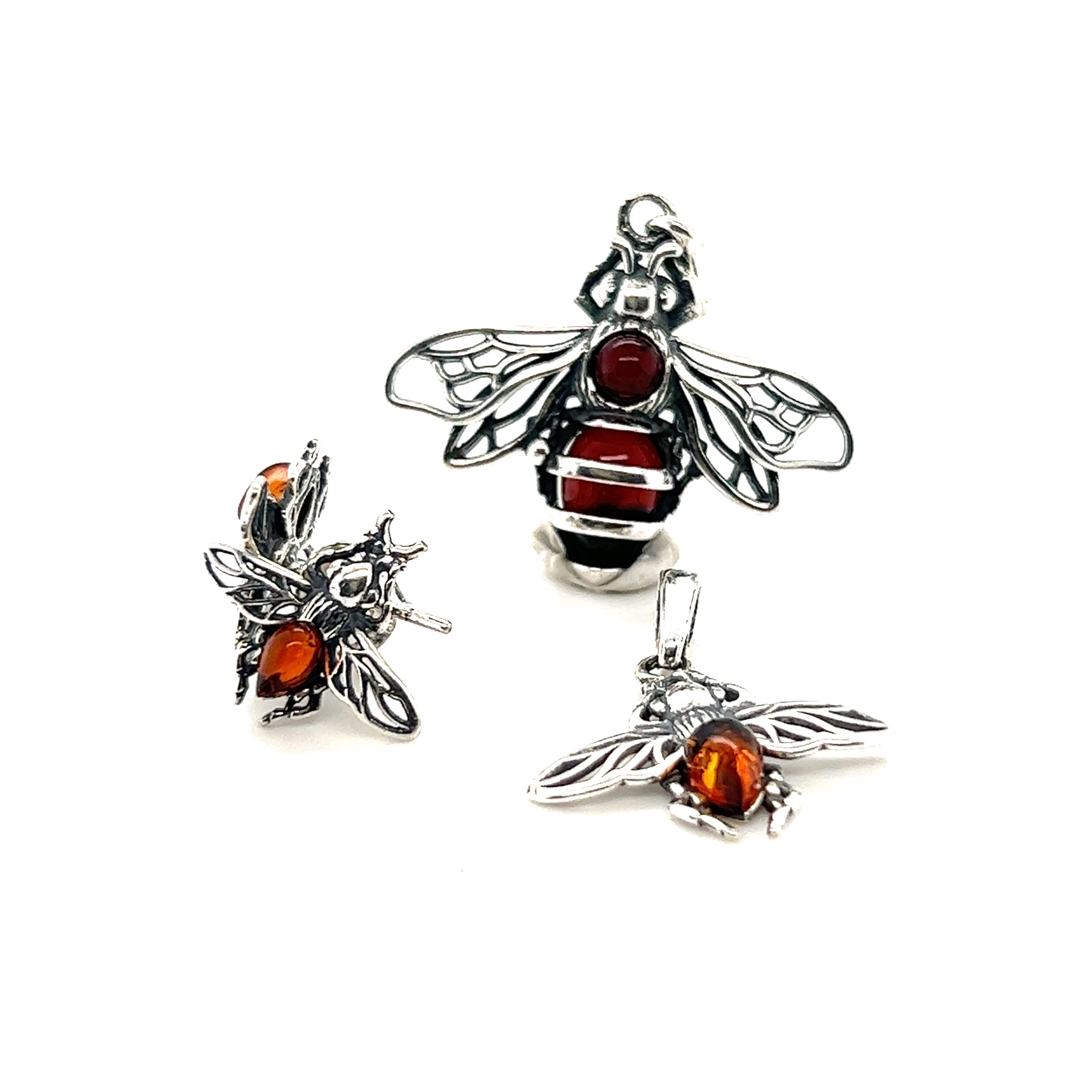 Super Silver presents the Delicate Amber Bee Pendant set, featuring a sterling silver necklace and earrings, adorned with stunning baltic amber. Perfect jewelry for bee enthusiasts.