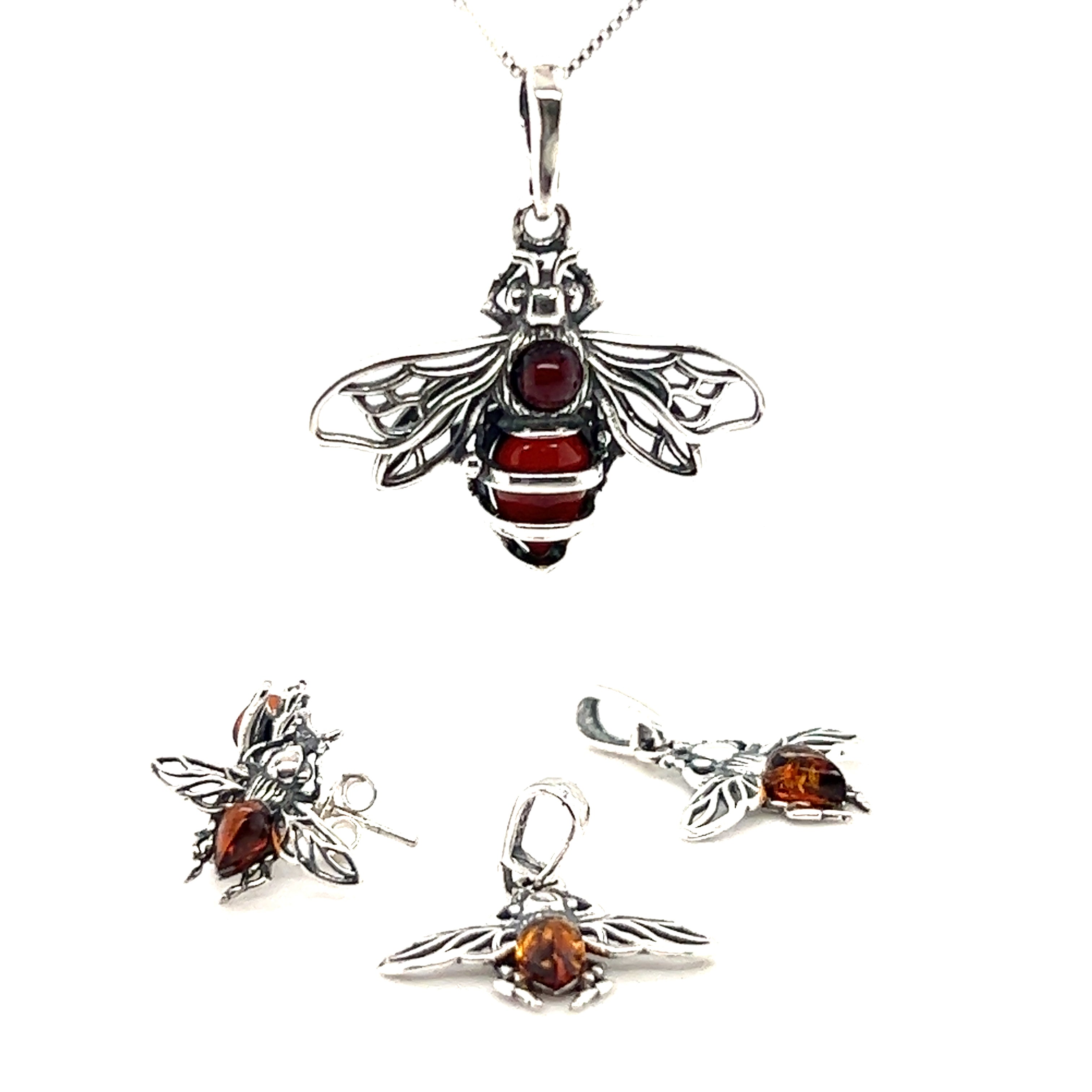 Stunning Super Silver "Delicate Amber Bee Pendant" and earrings set featuring a beautiful baltic amber accent. Perfect for any jewelry lover or nature enthusiast.