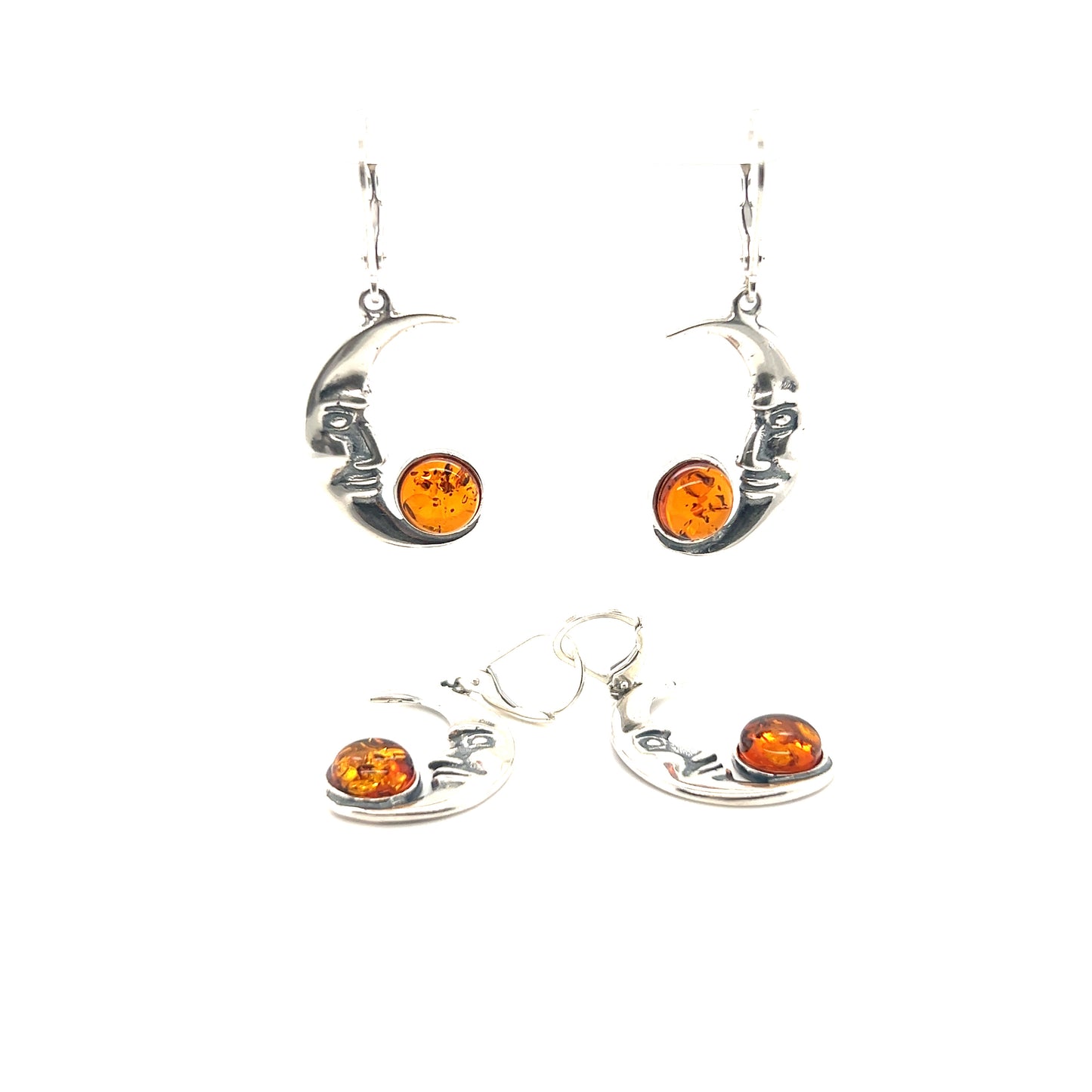 
                  
                    Super Silver Amber Man-in-the-Moon Earrings with a delicate crescent moon design.
                  
                