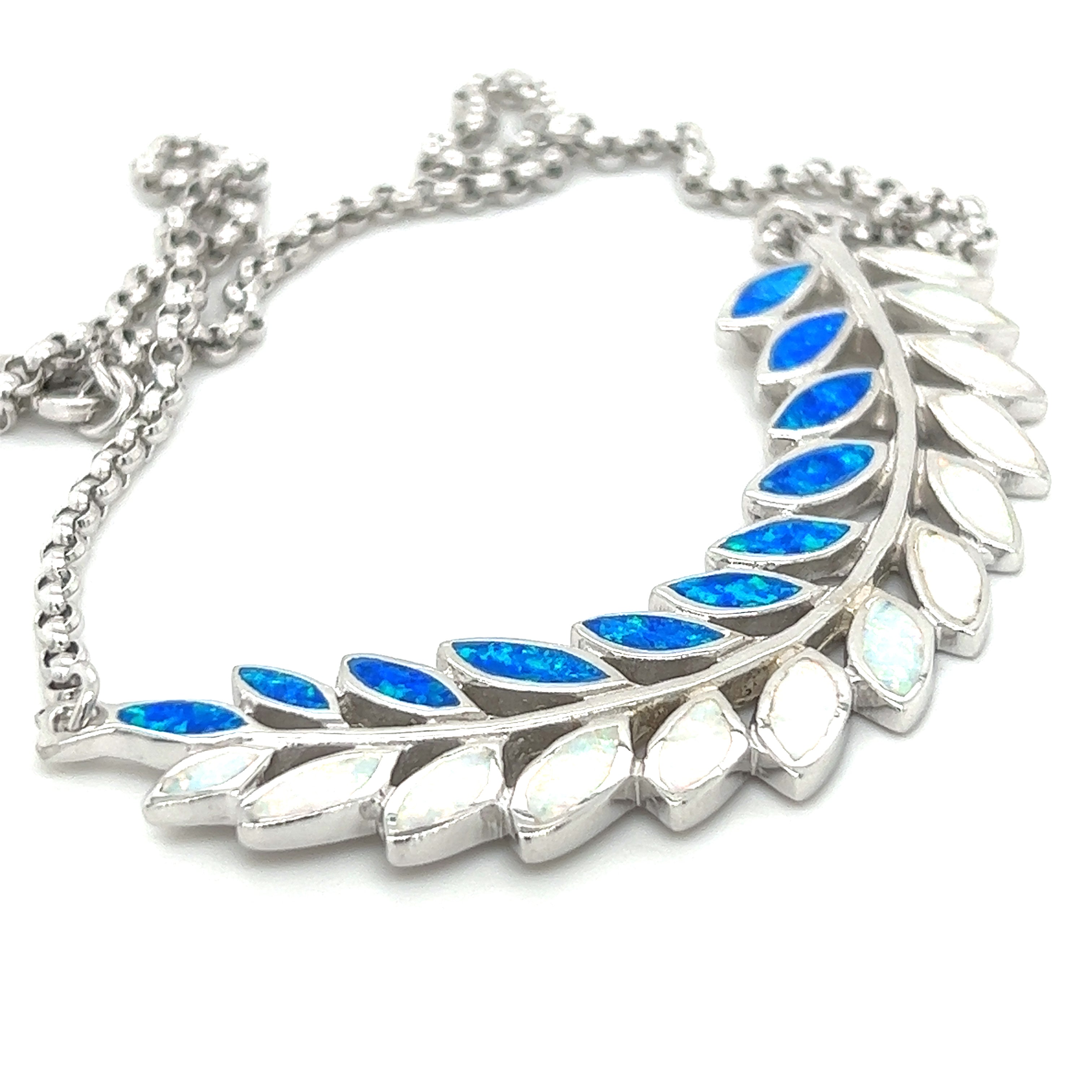 A Super Silver Stunning Opal Branch Necklace with blue leaf designs and a rhodium finish.