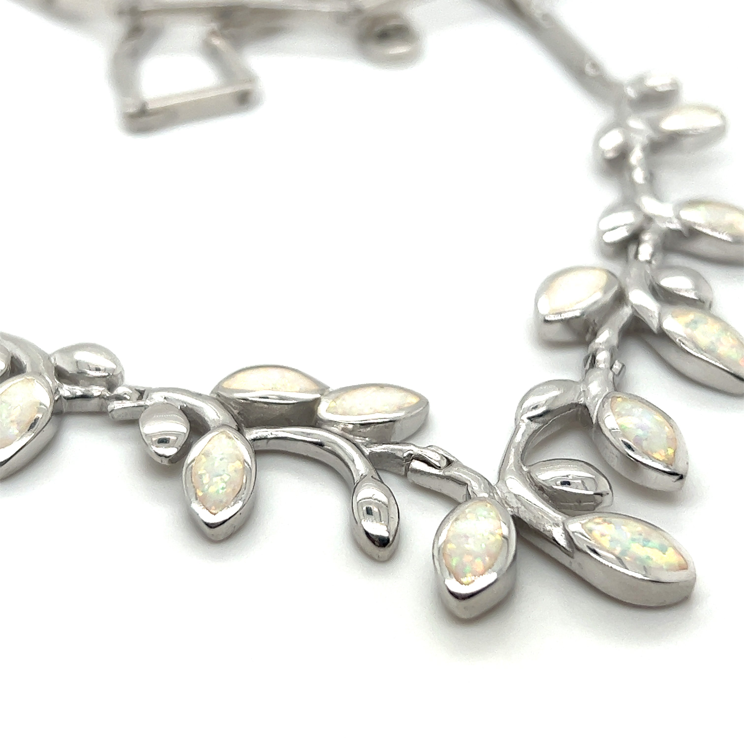 A Super Silver Elegant Opal Vine Necklace on a white background.
