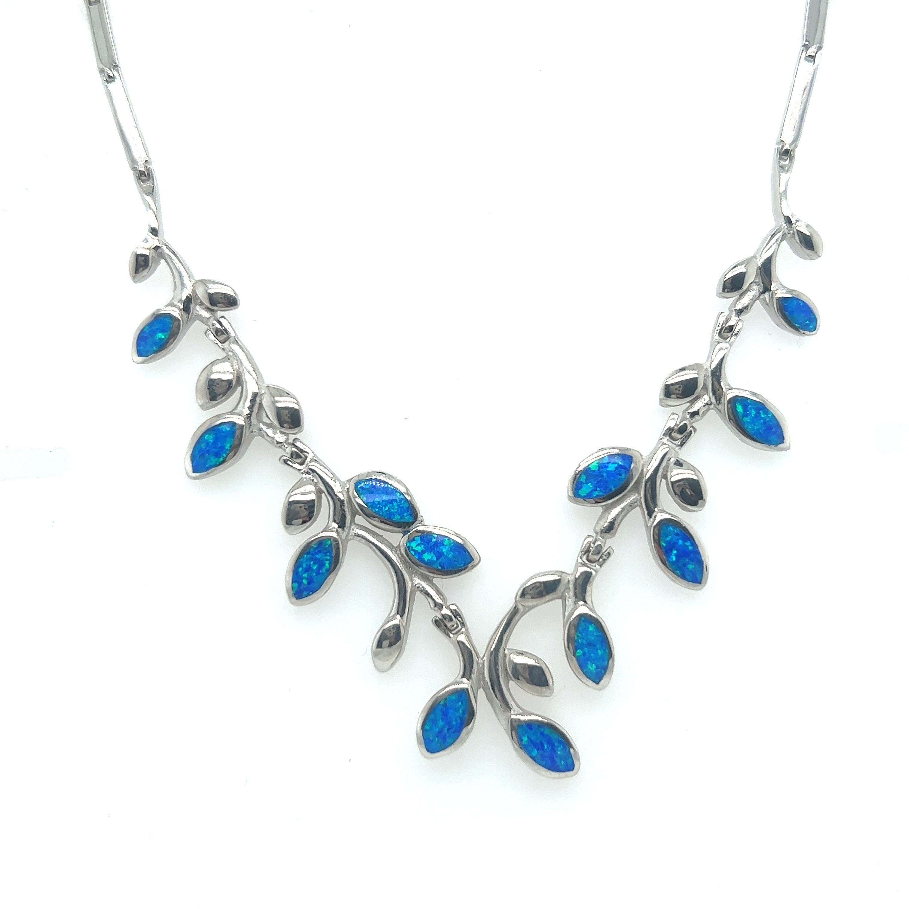 A Super Silver Elegant Opal Vine Necklace adorned with blue opal leaves.