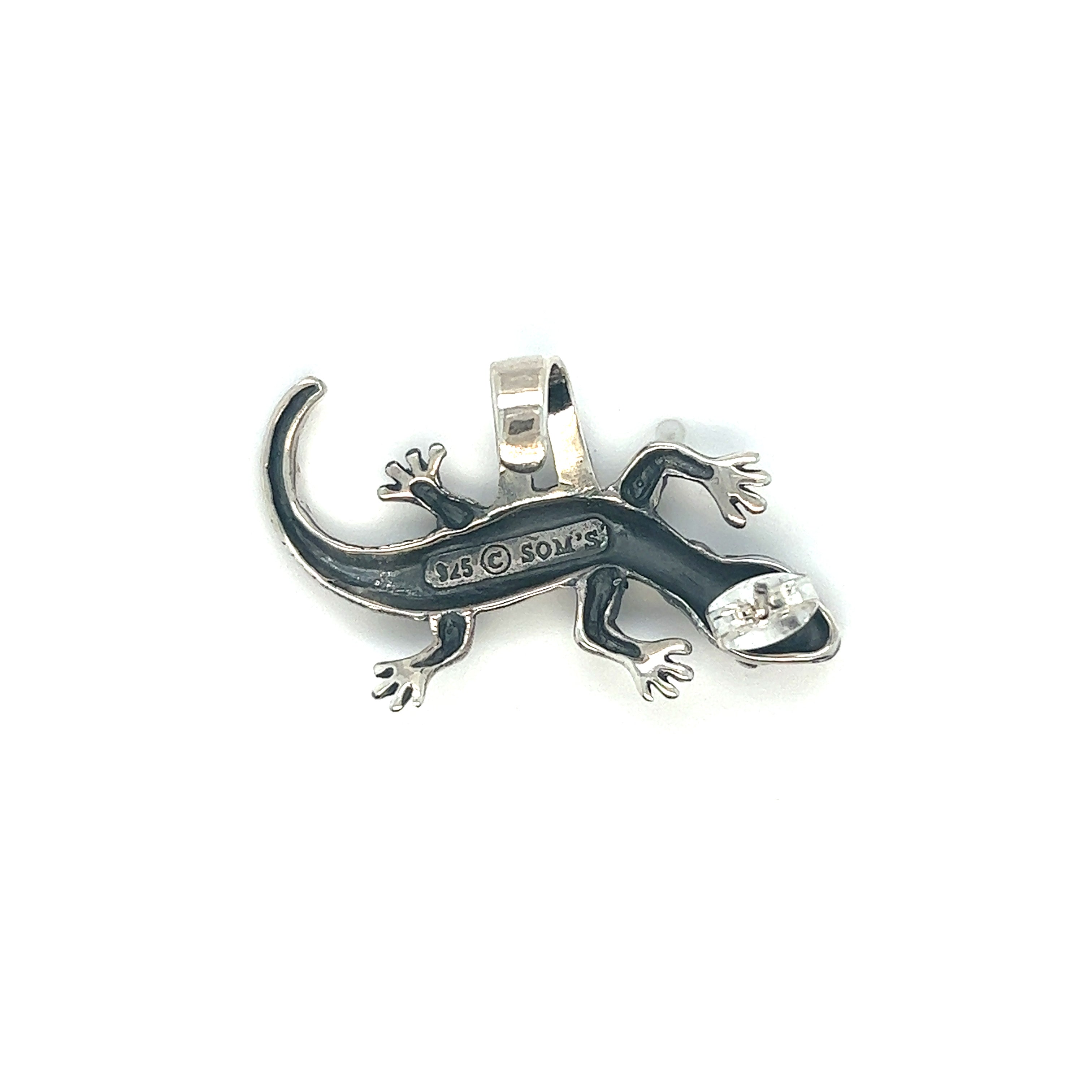A Super Silver Unique Gecko Ear Cuff on a white background, symbolizing resilience and adaptability.