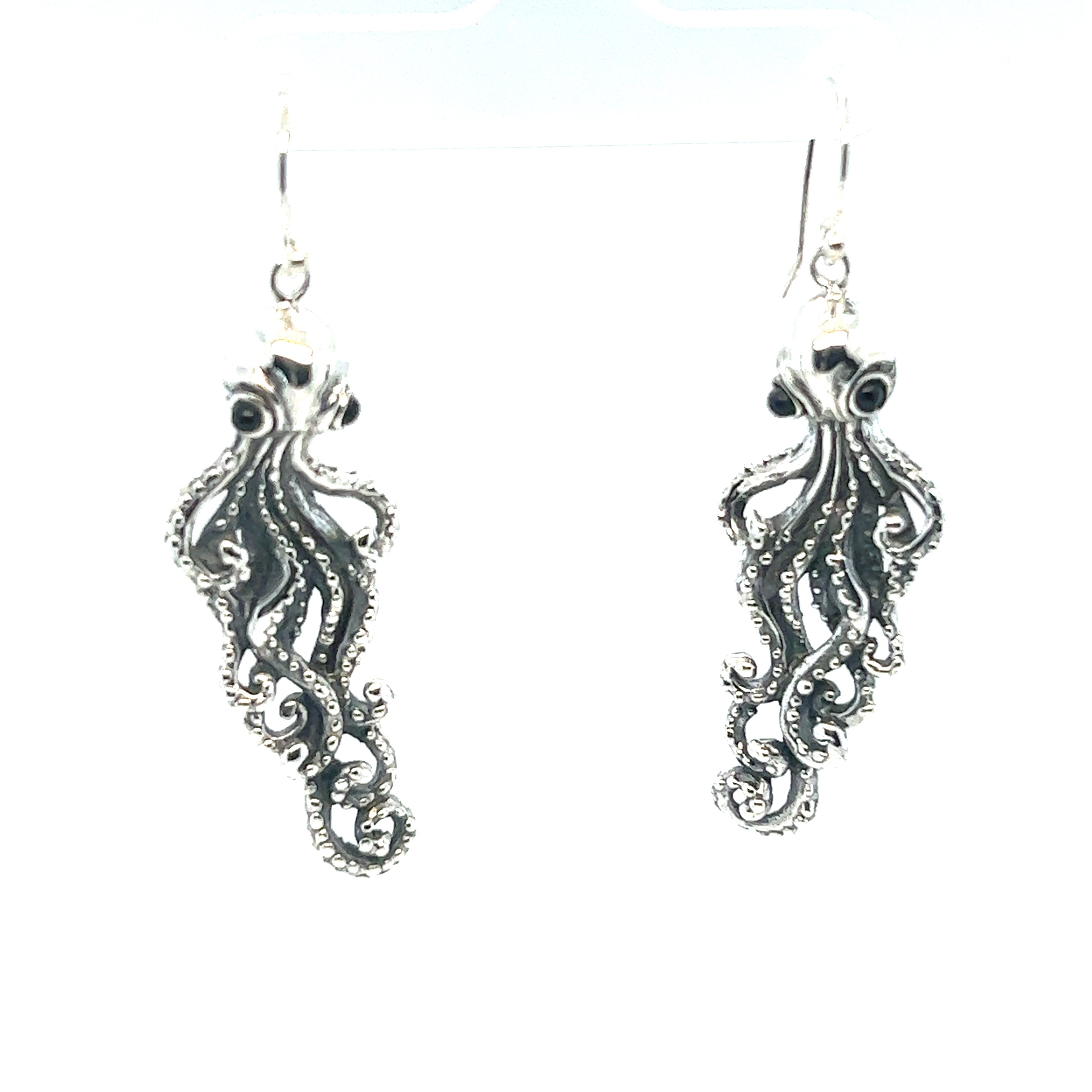 A pair of Super Silver Captivating Statement Octopus Earrings on a white background.
