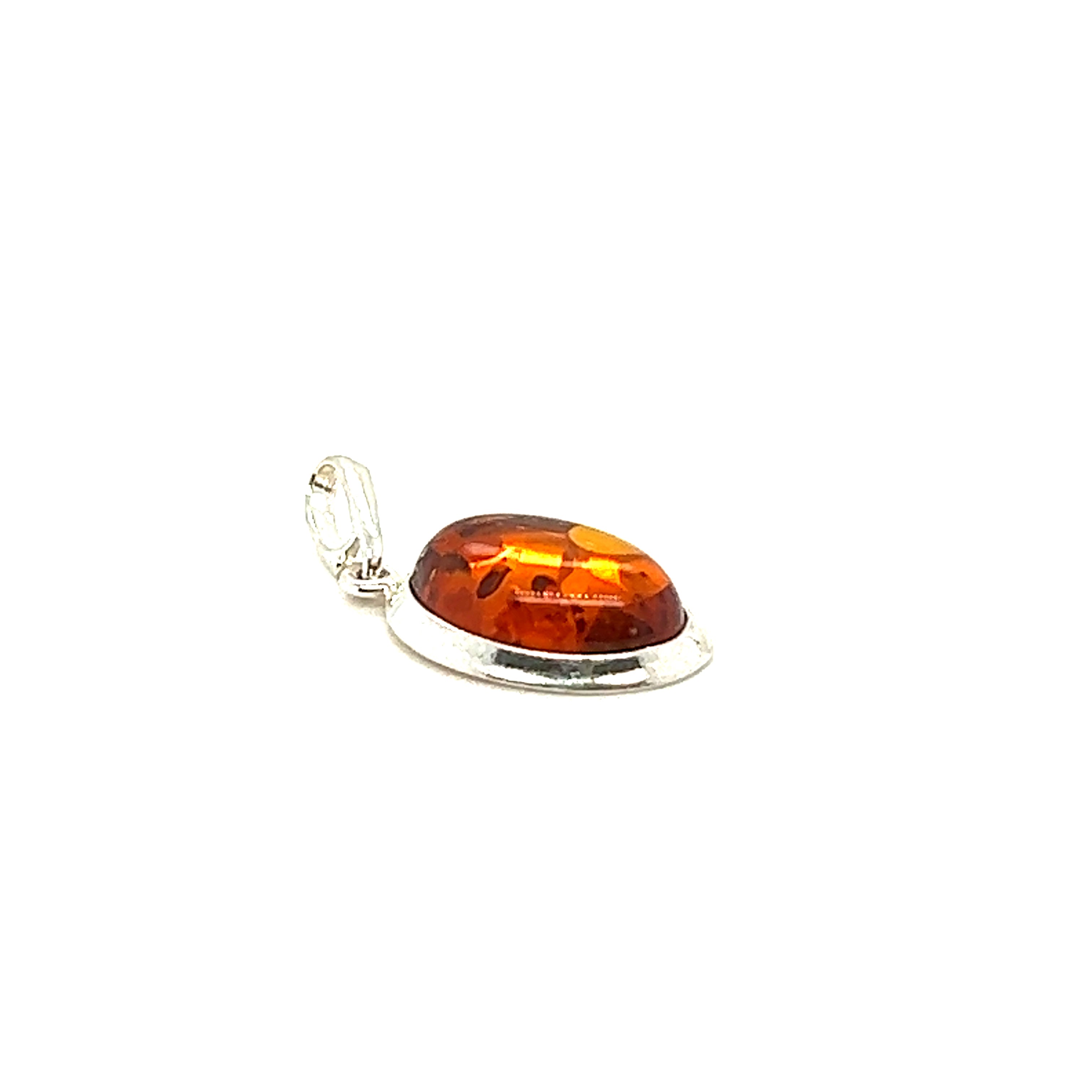 A Super Silver sterling silver bezel pendant with a Simple Framed Oval Amber Pendant.