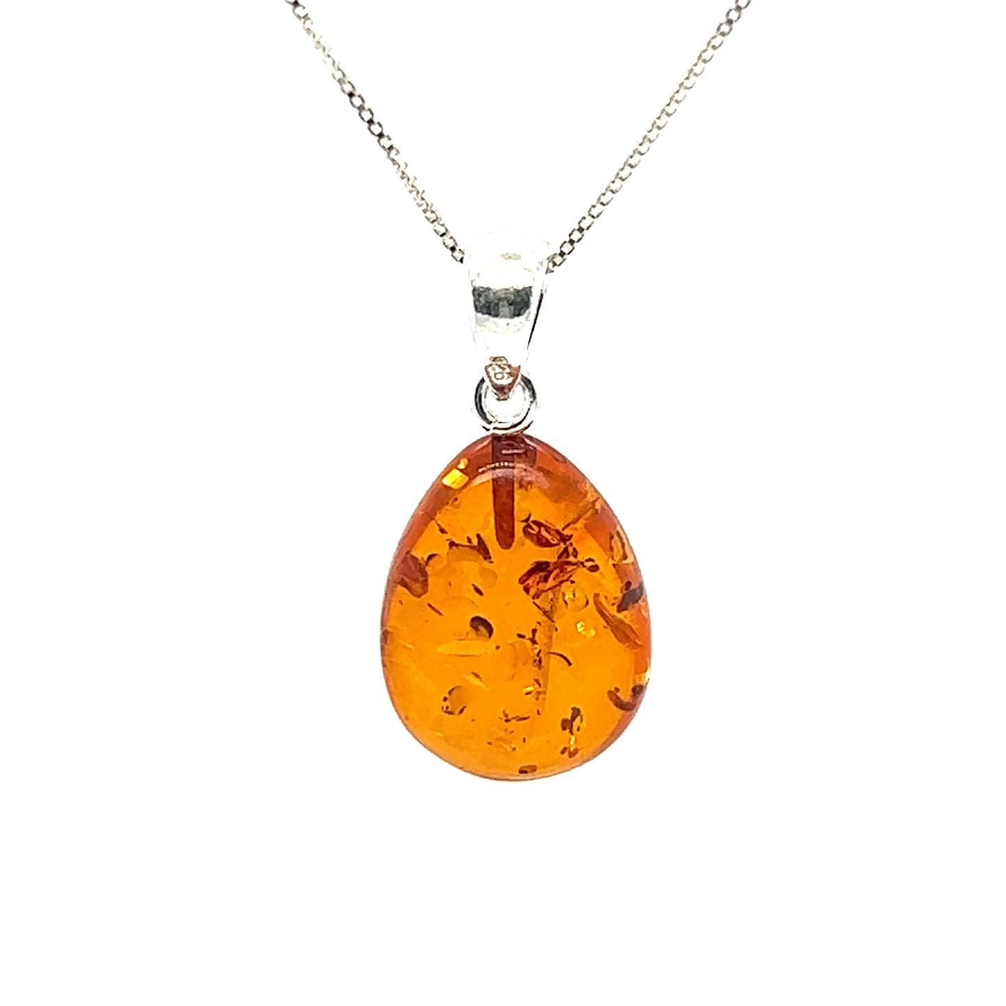 A Super Silver Teardrop Amber Pendant necklace exuding healing energy, perfect for boho minimalism.