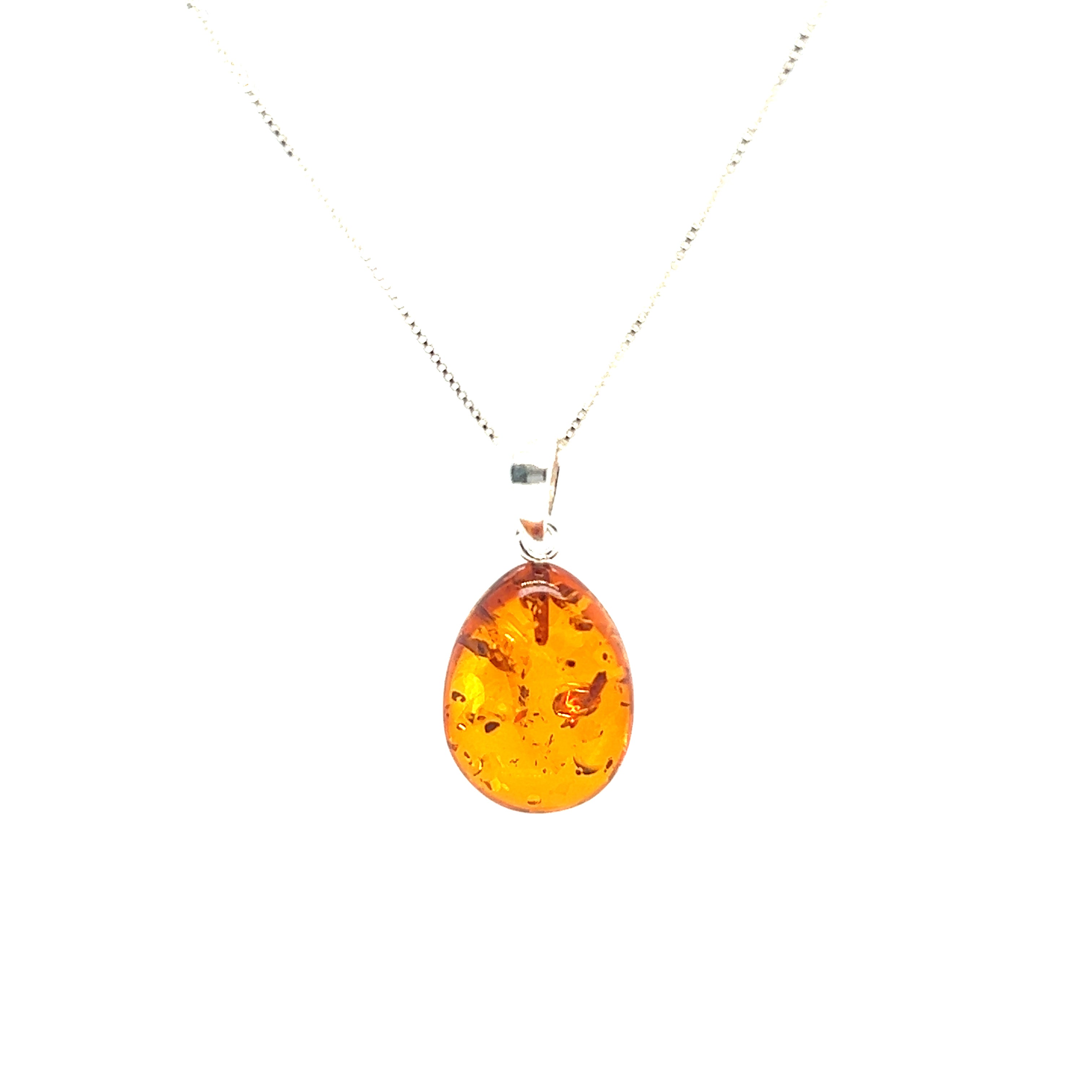 A Super Silver Teardrop Amber pendant with a yellow flower, exuding healing energy.