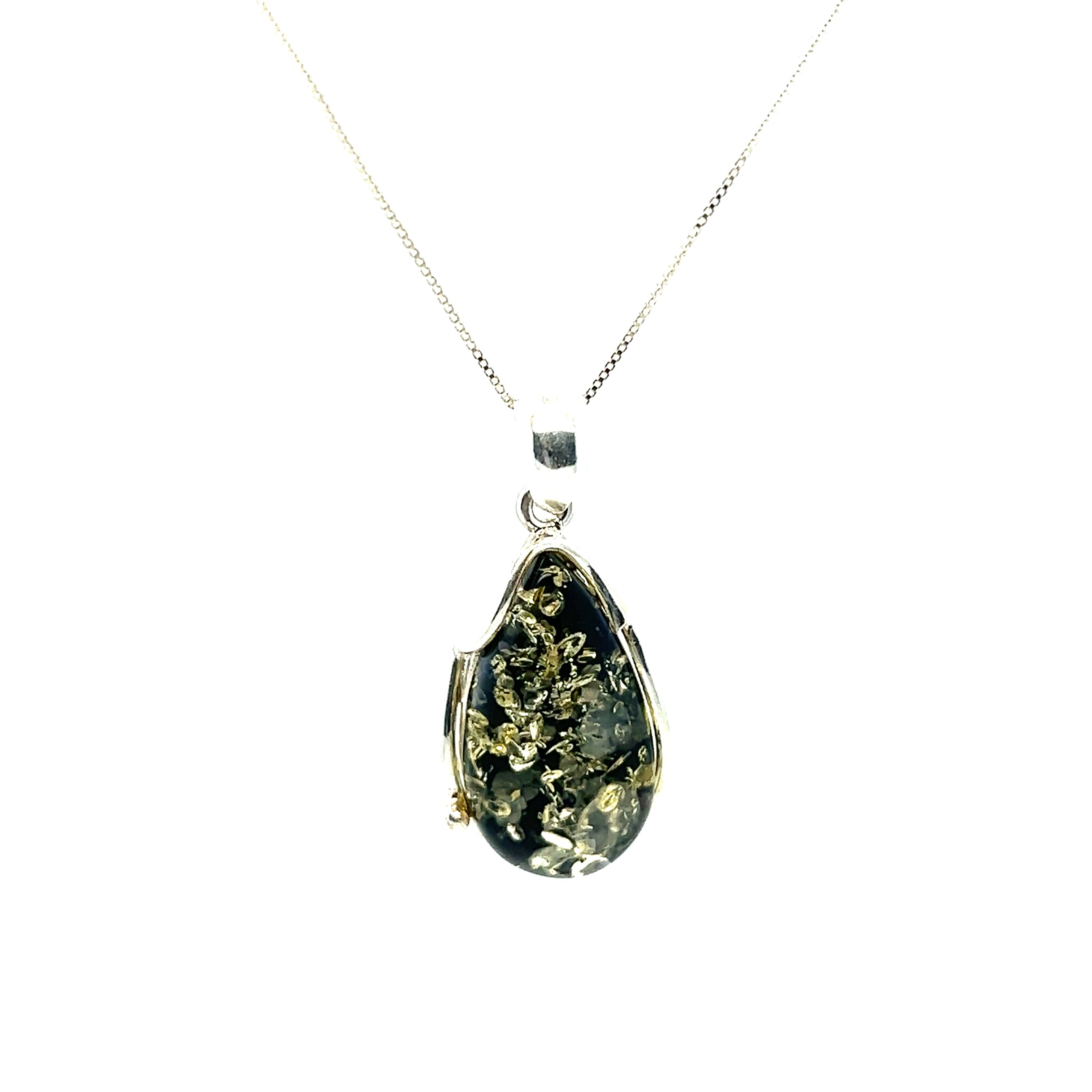 A Large Green Amber Pendant on a Super Silver chain.