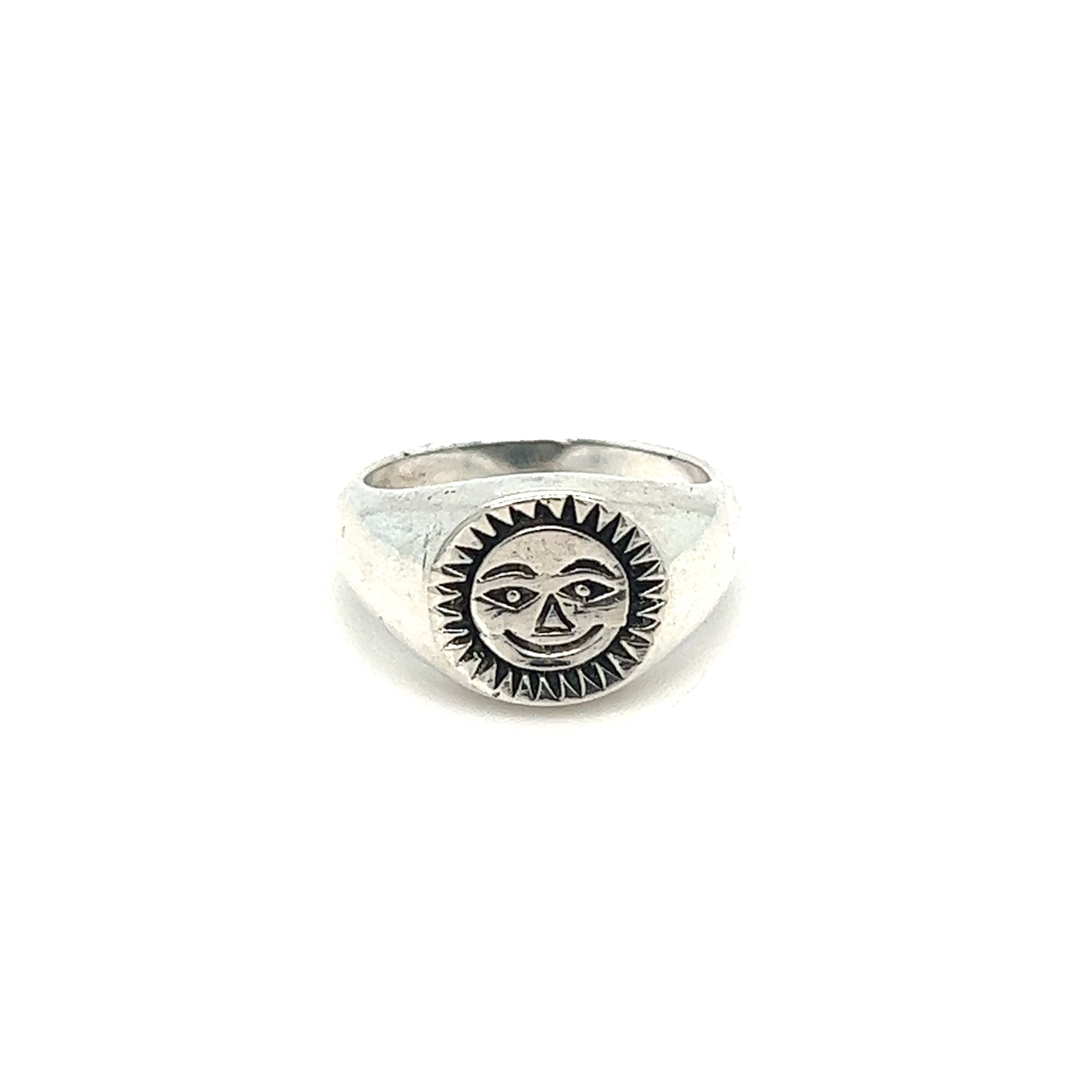 A Smiling Sun Signet Ring in silver with a Super Silver face.