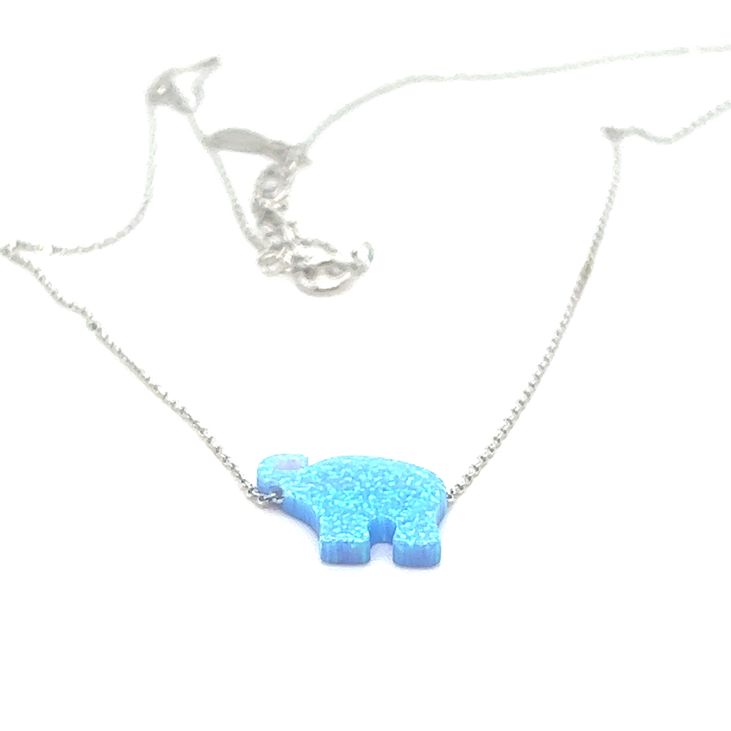 A Super Silver Blue Opal Elephant Necklace on a chain.