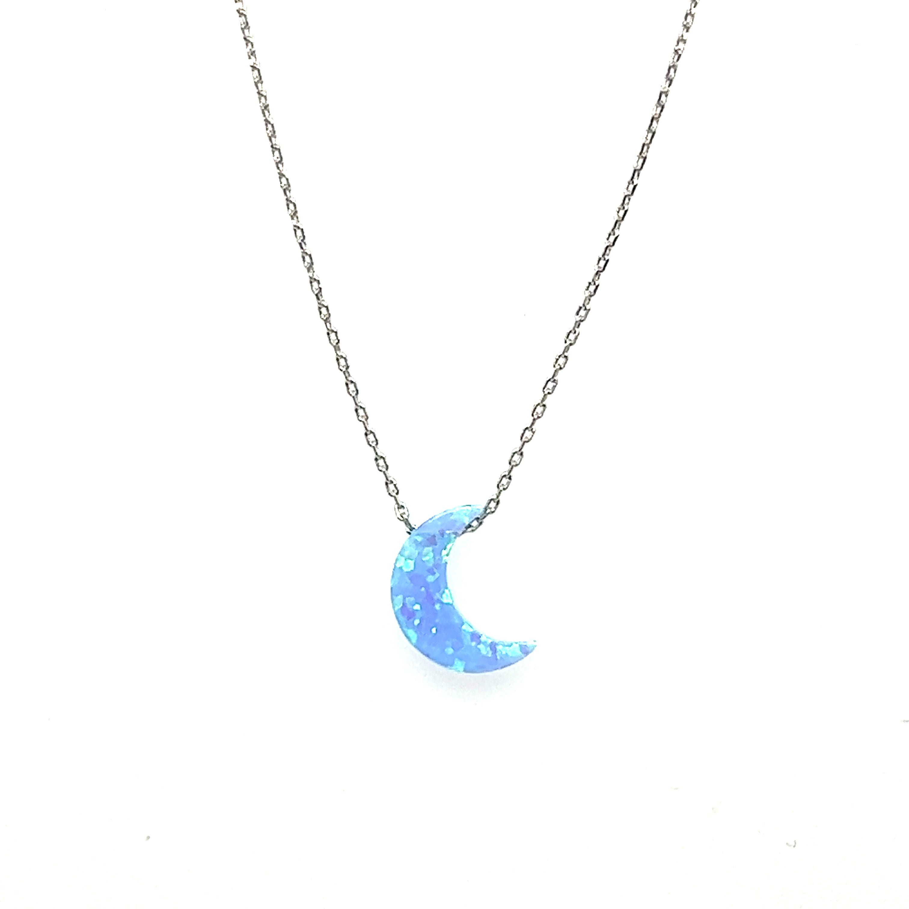 A Super Silver Blue Opal Moon Necklace featuring a blue moon.