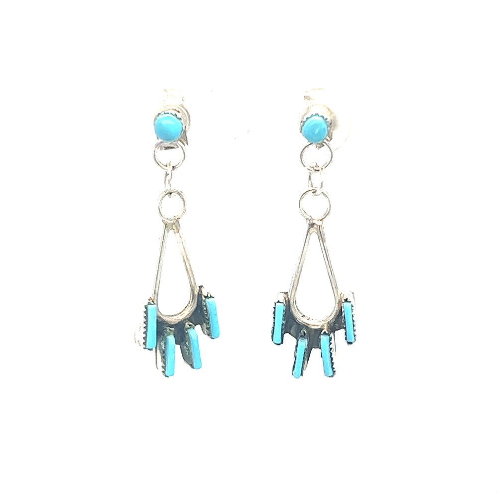 
                  
                    Super Silver's Delicate Needlepoint Zuni Turquoise Earrings on a white background.
                  
                
