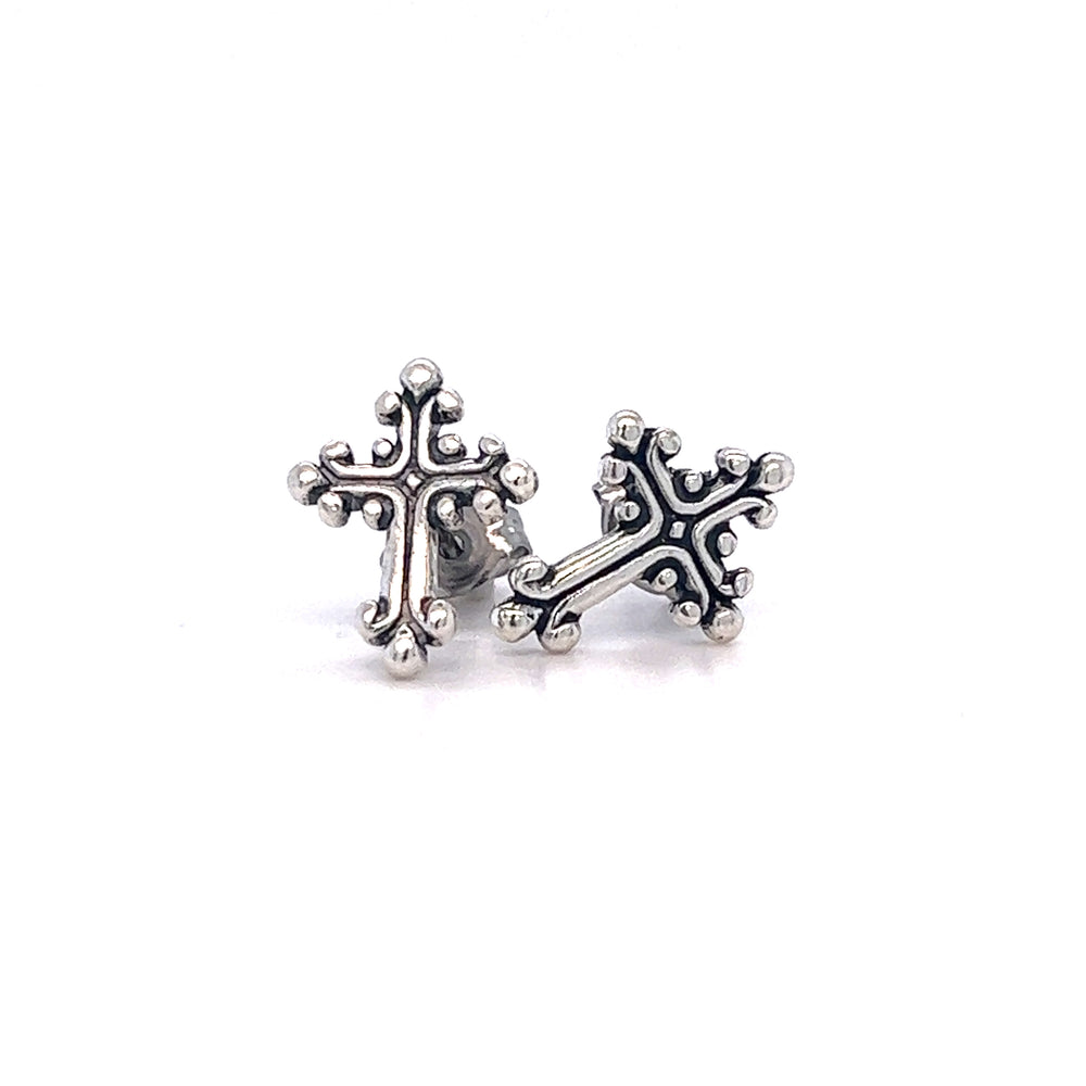 A pair of Super Silver Ornate Cross Studs with oxidized detailing.